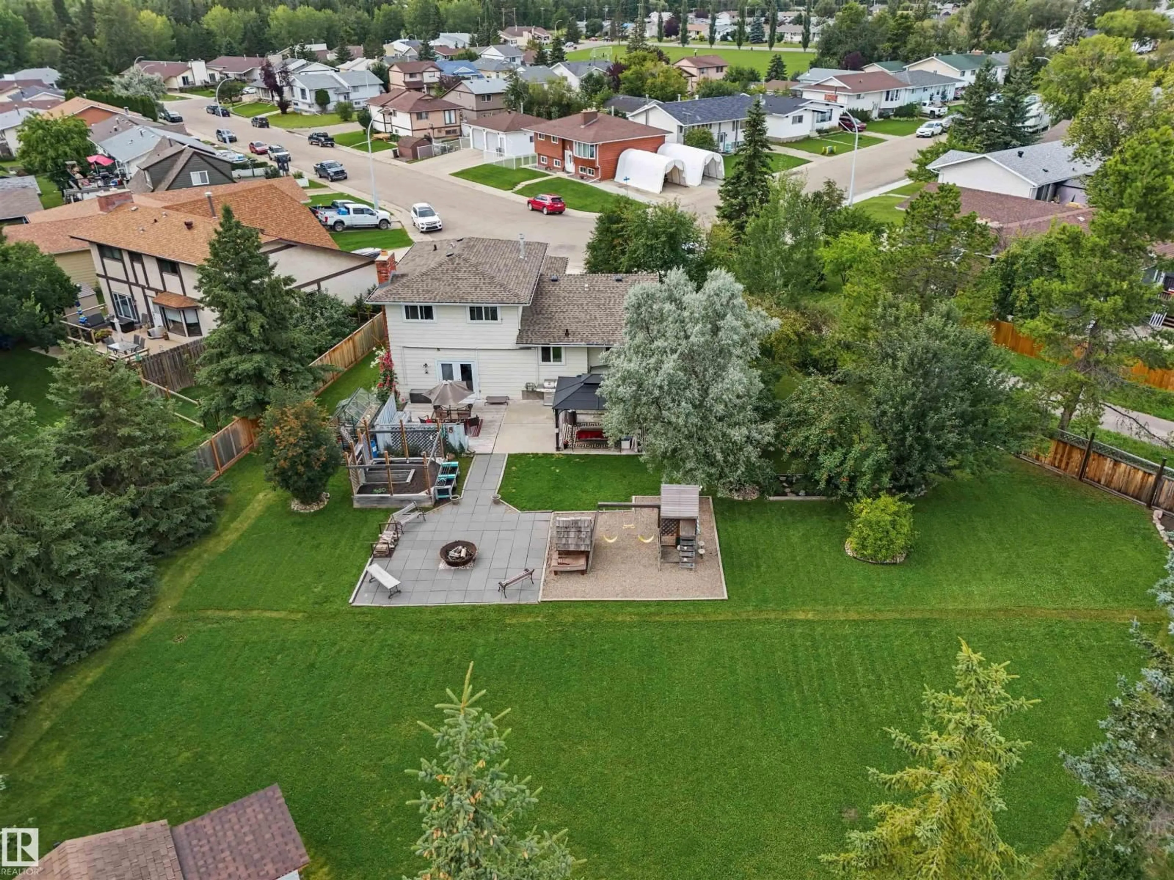 A pic from outside/outdoor area/front of a property/back of a property/a pic from drone, mountain view for 5403 43 AV, Drayton Valley Alberta T7A1K5