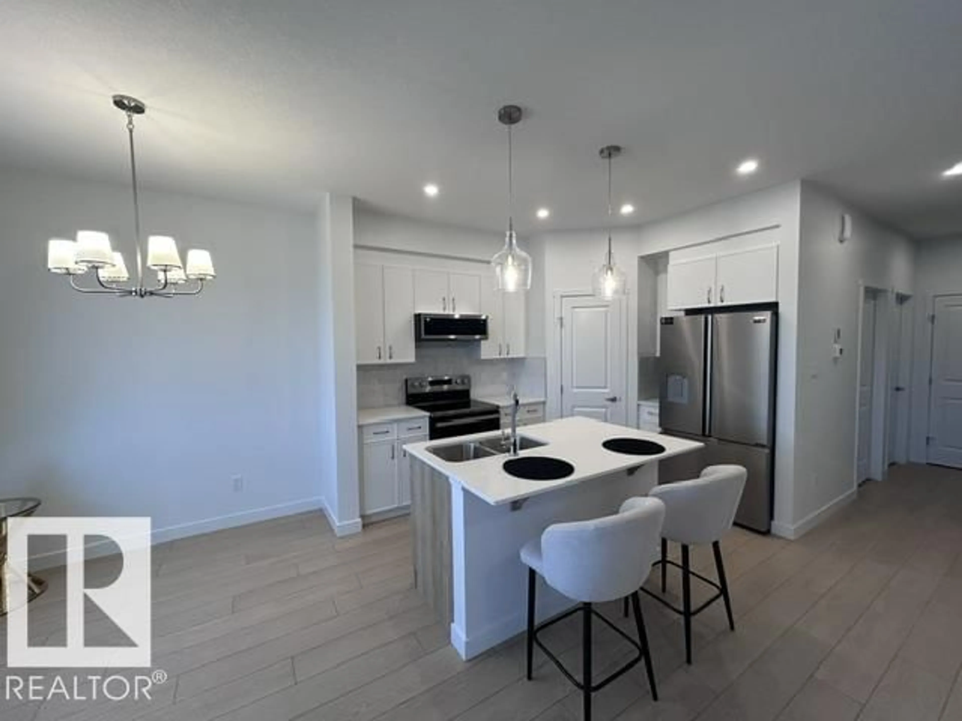 Open concept kitchen, unknown for 20936 16 AV, Edmonton Alberta T6M3J4
