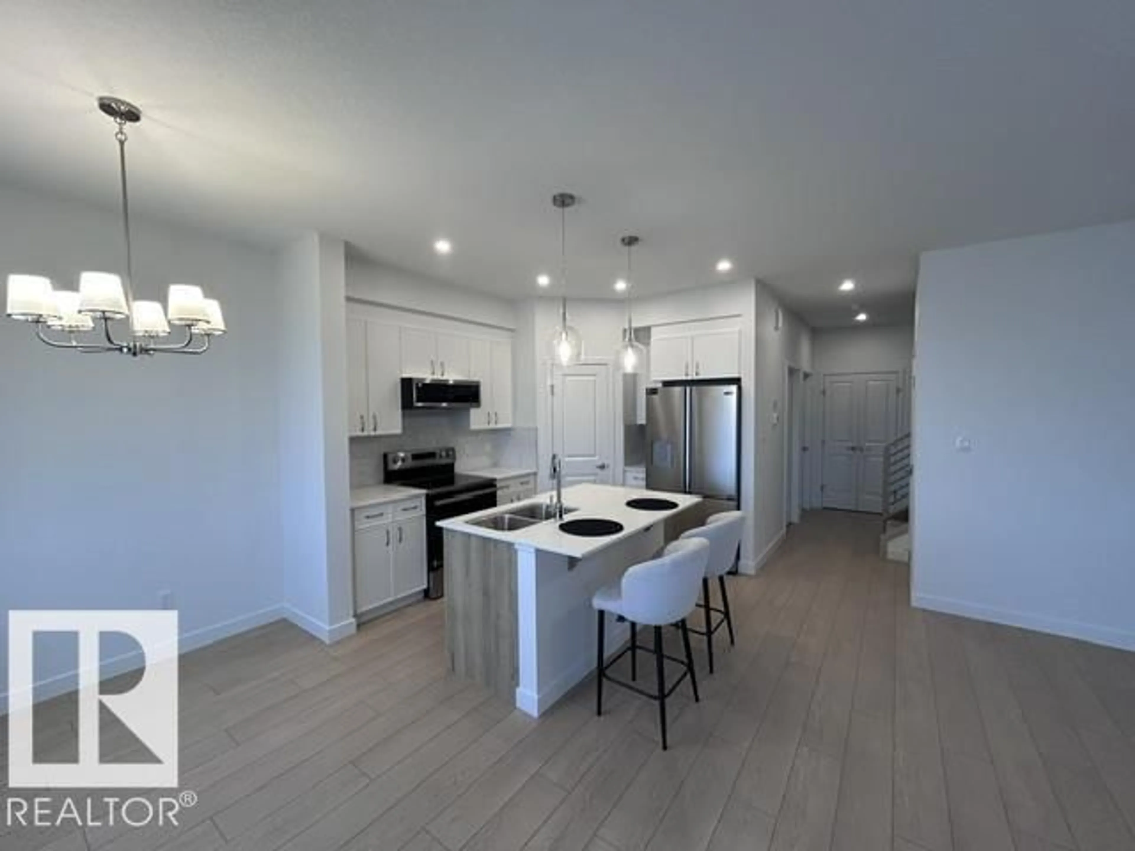 Open concept kitchen, unknown for 20936 16 AV, Edmonton Alberta T6M3J4