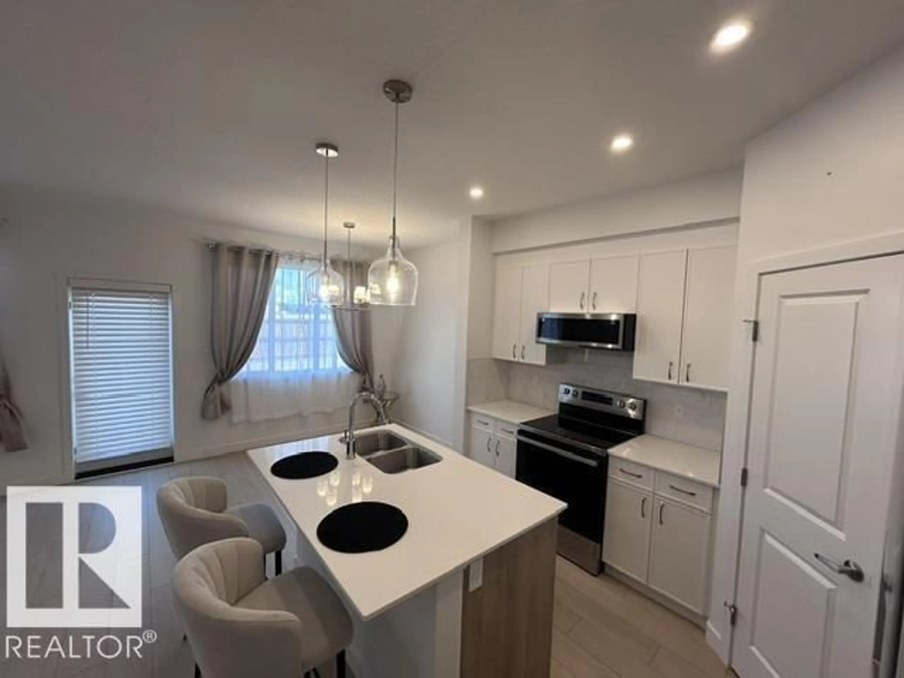 Open concept kitchen, unknown for 20936 16 AV, Edmonton Alberta T6M3J4