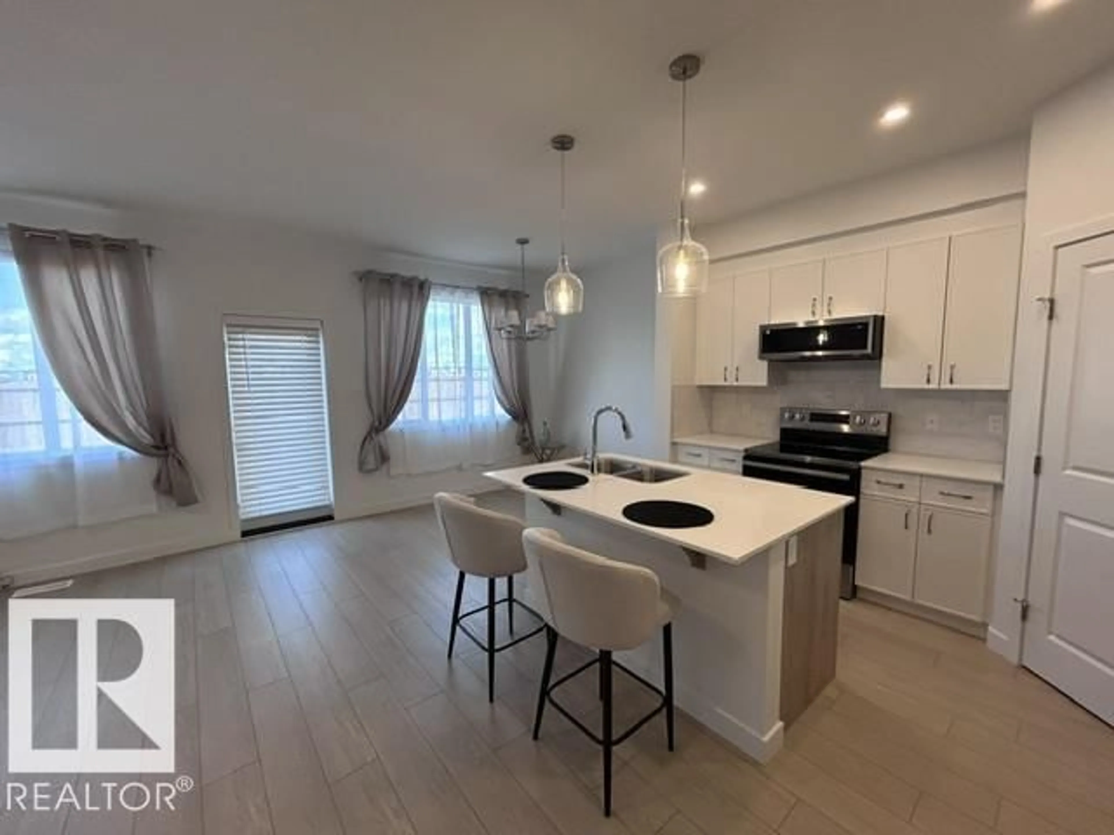 Open concept kitchen, unknown for 20936 16 AV, Edmonton Alberta T6M3J4