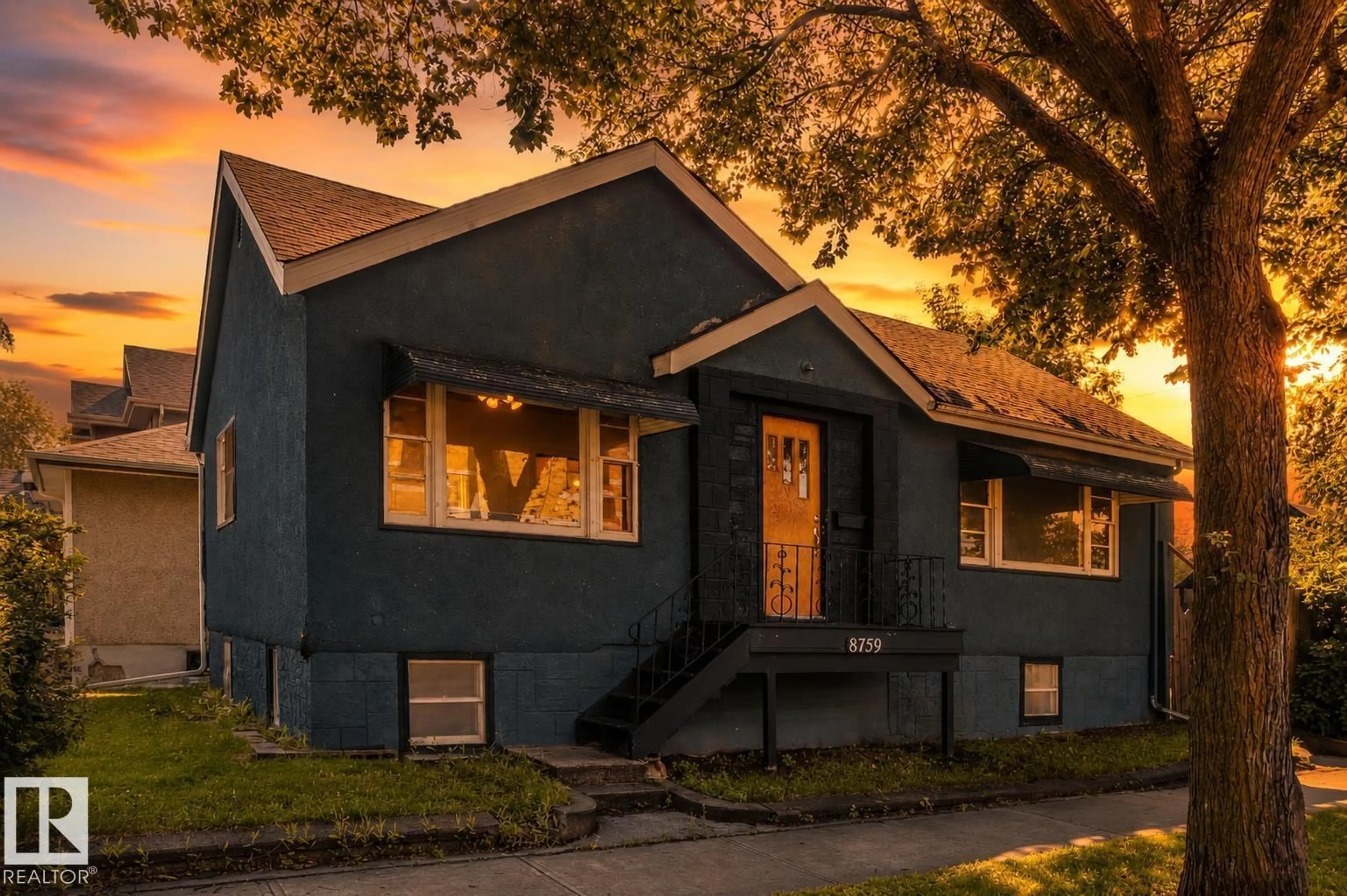 Home with vinyl exterior material, street for NW - 8759 78 AV, Edmonton Alberta T6C0N5
