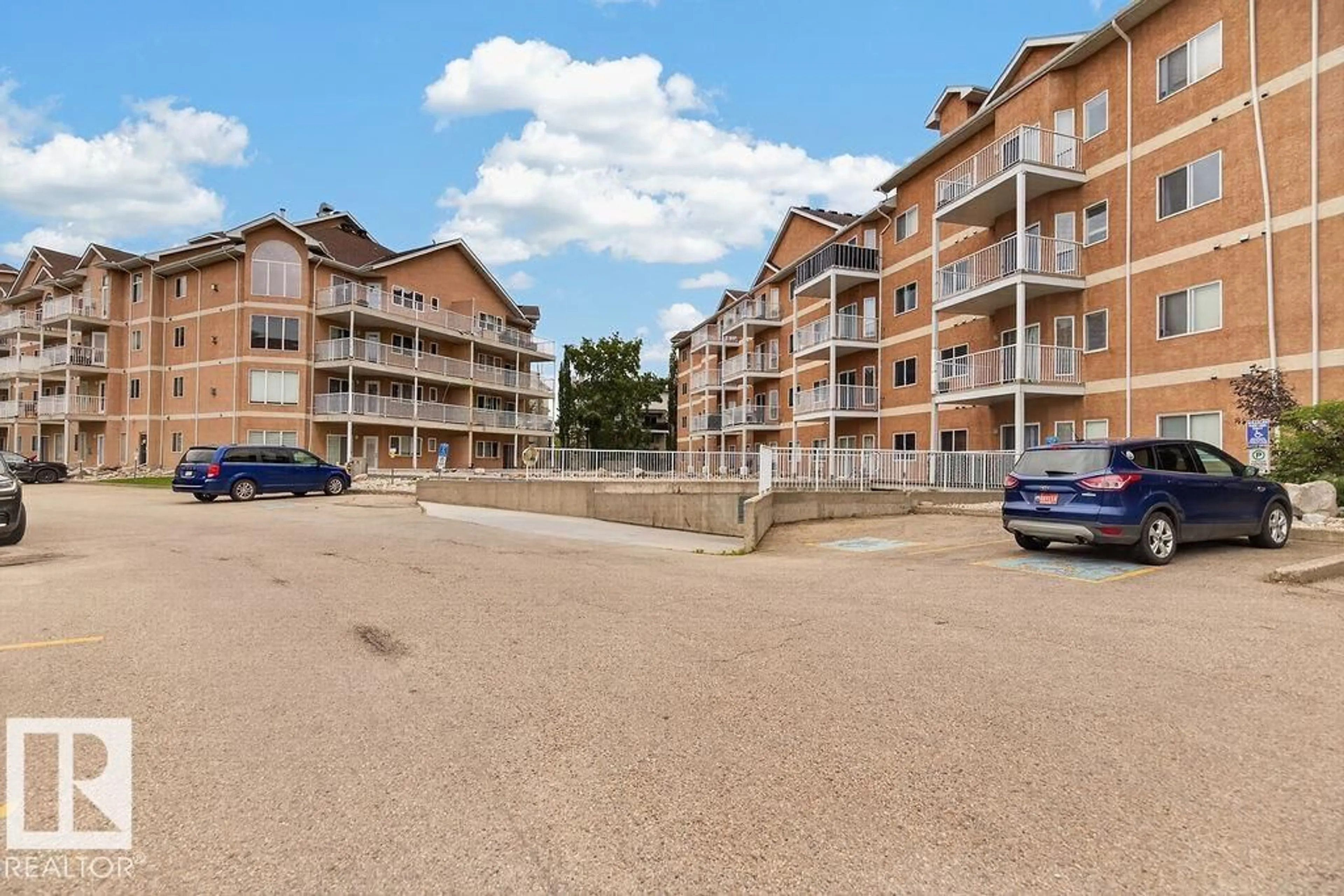 A pic from outside/outdoor area/front of a property/back of a property/a pic from drone, unknown for #205 - 4304 139 AV, Edmonton Alberta T5Y0H6