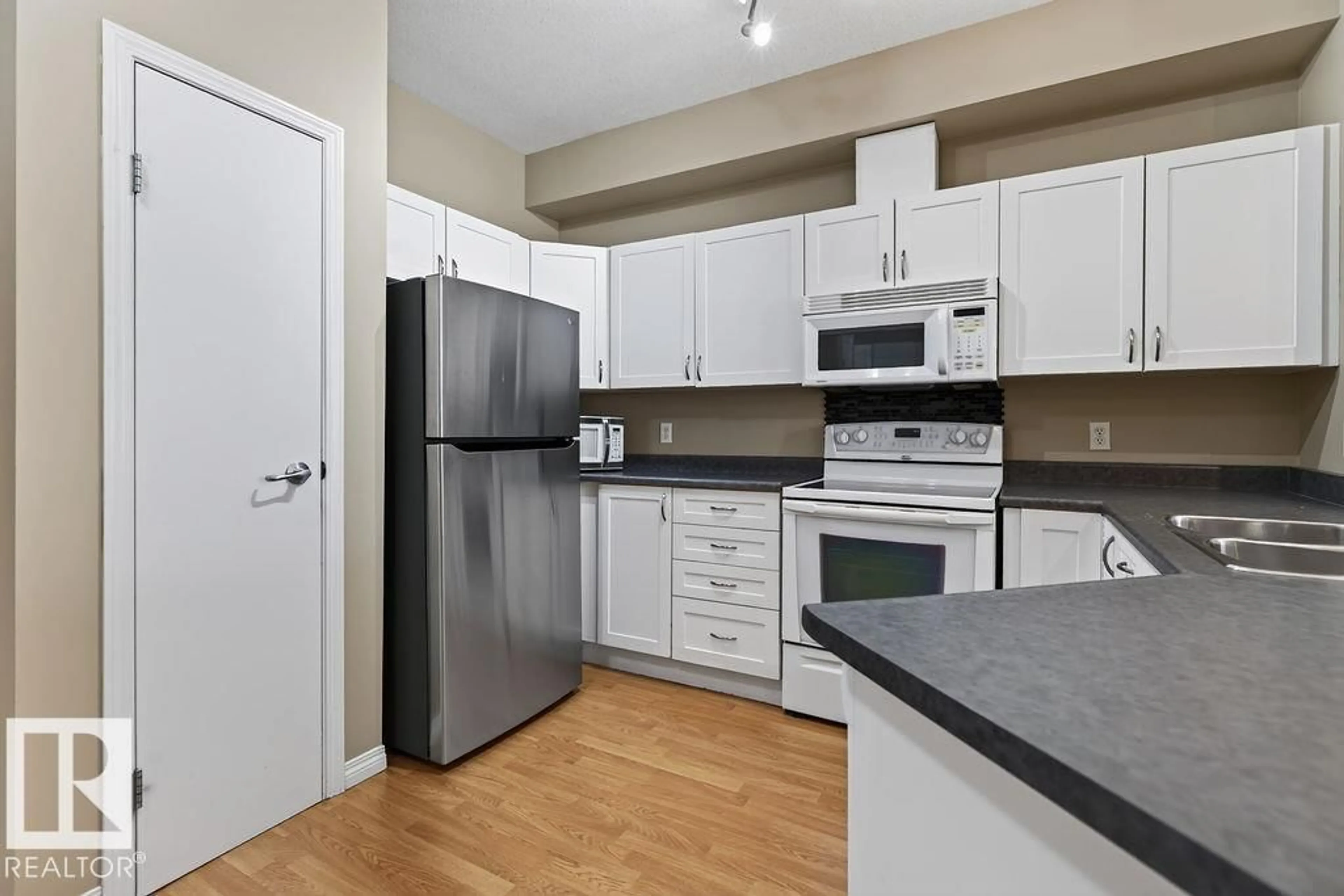 Standard kitchen, unknown for #205 - 4304 139 AV, Edmonton Alberta T5Y0H6