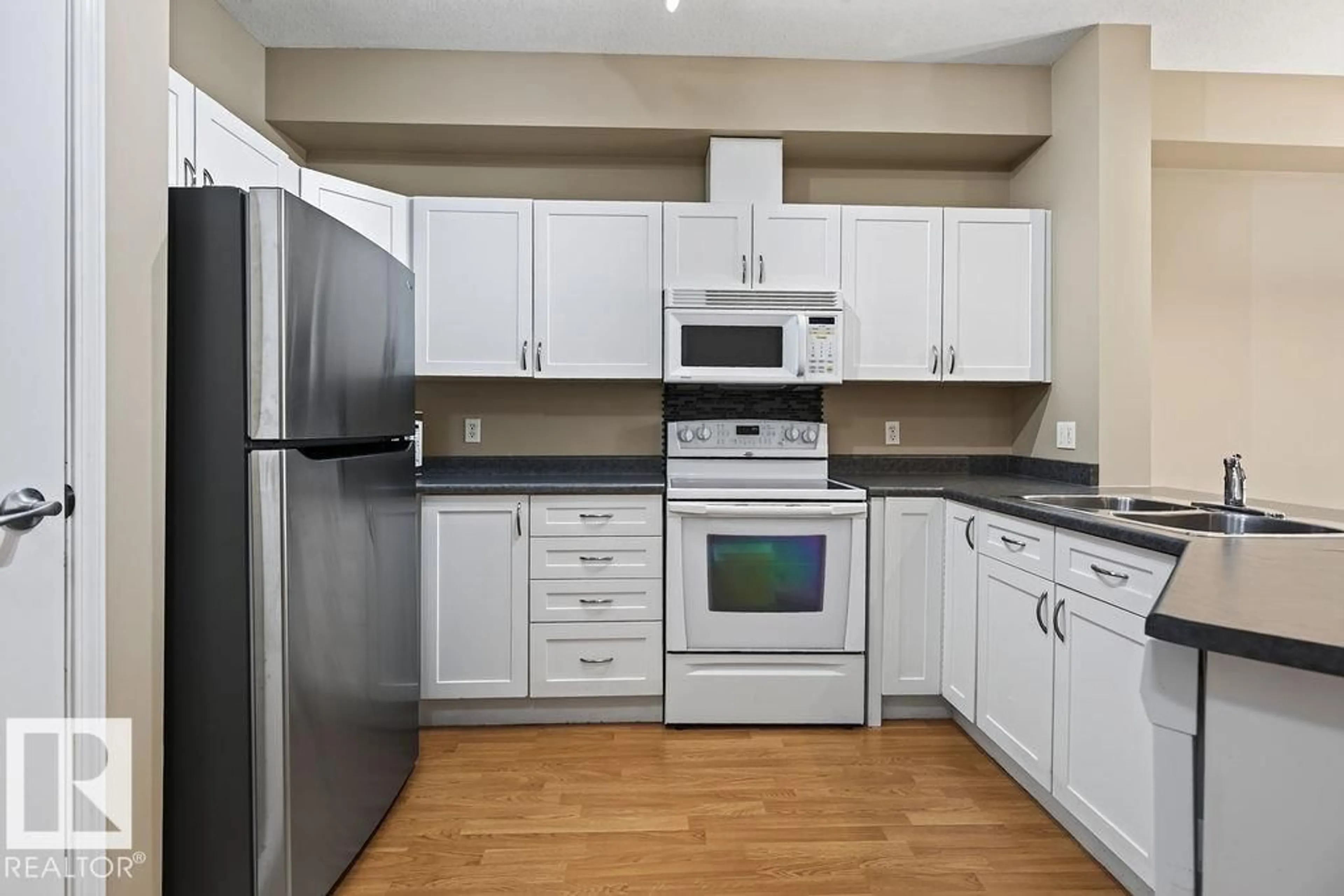 Standard kitchen, unknown for #205 - 4304 139 AV, Edmonton Alberta T5Y0H6