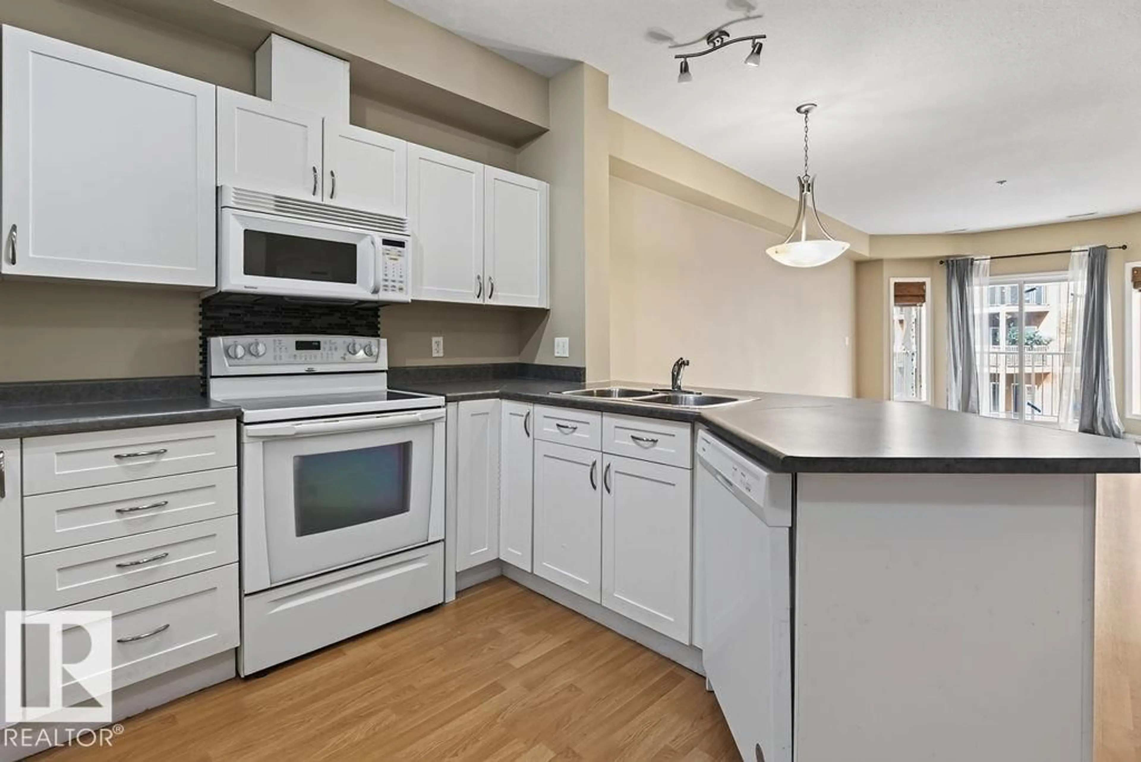 Standard kitchen, unknown for #205 - 4304 139 AV, Edmonton Alberta T5Y0H6