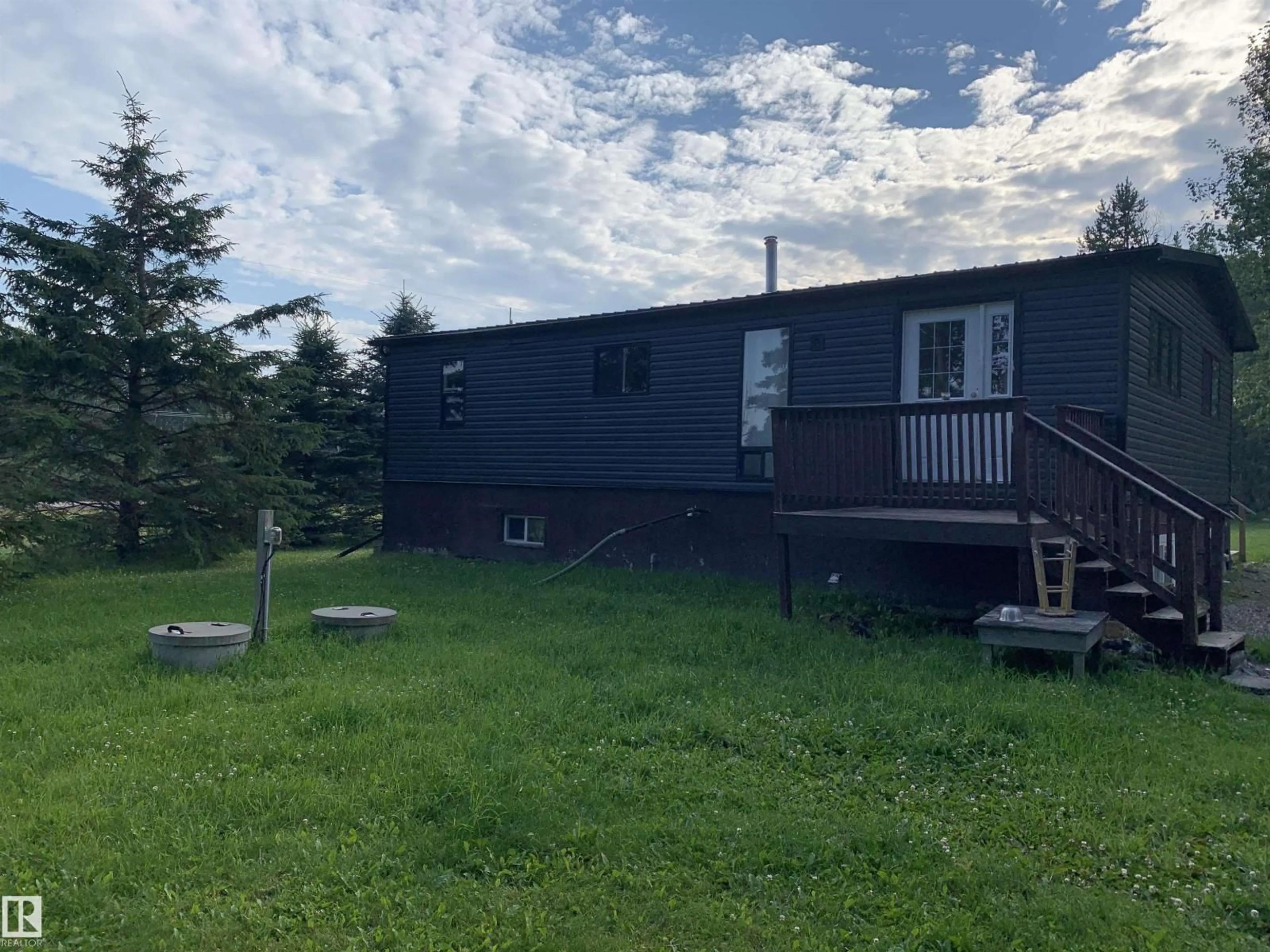 A pic from outside/outdoor area/front of a property/back of a property/a pic from drone, mountain view for #23 - 53407 155 RD, Rural Yellowhead Alberta T7E3B5