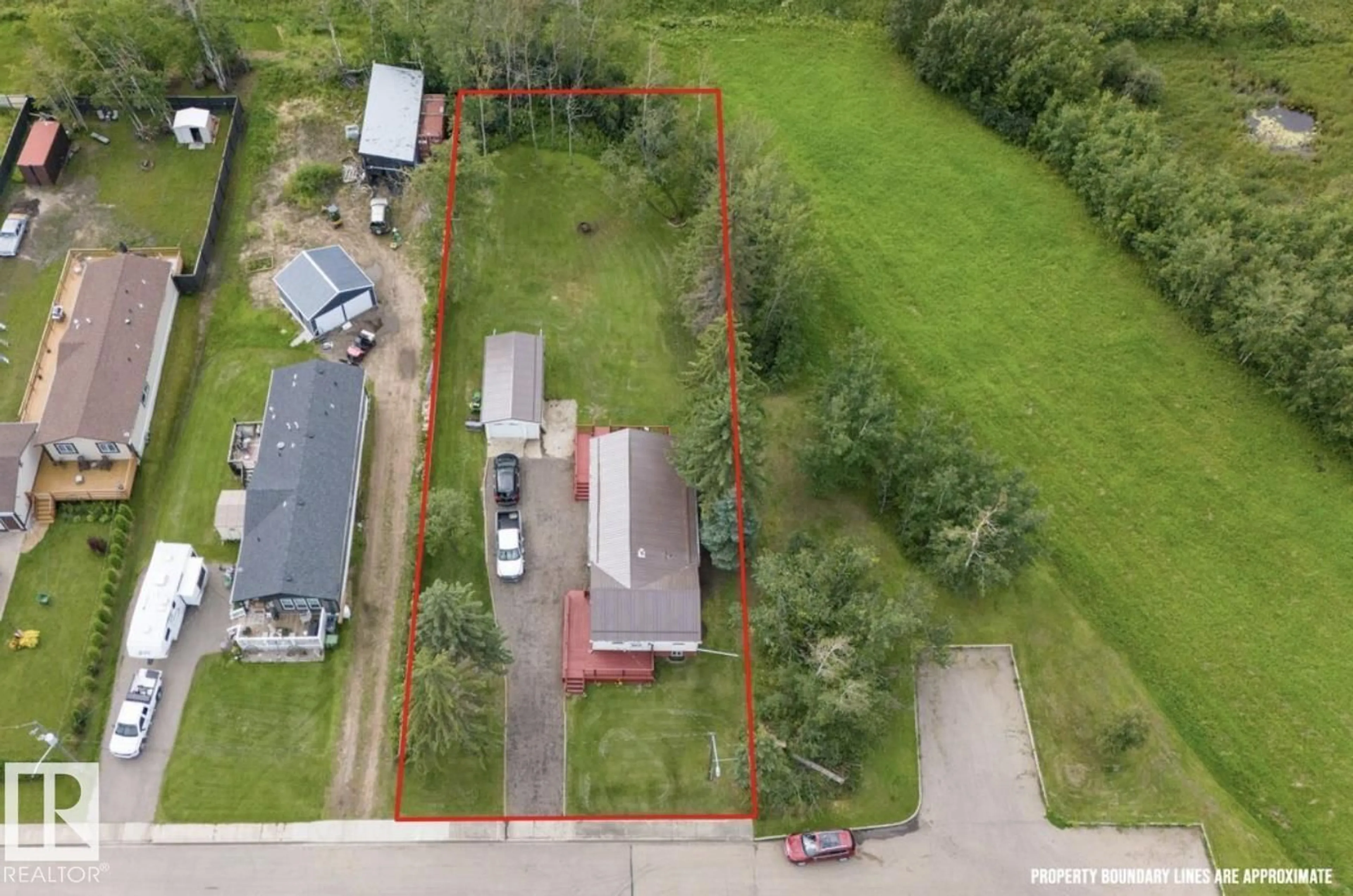 A pic from outside/outdoor area/front of a property/back of a property/a pic from drone, street for 5409 45 ST, Redwater Alberta T0A2W0