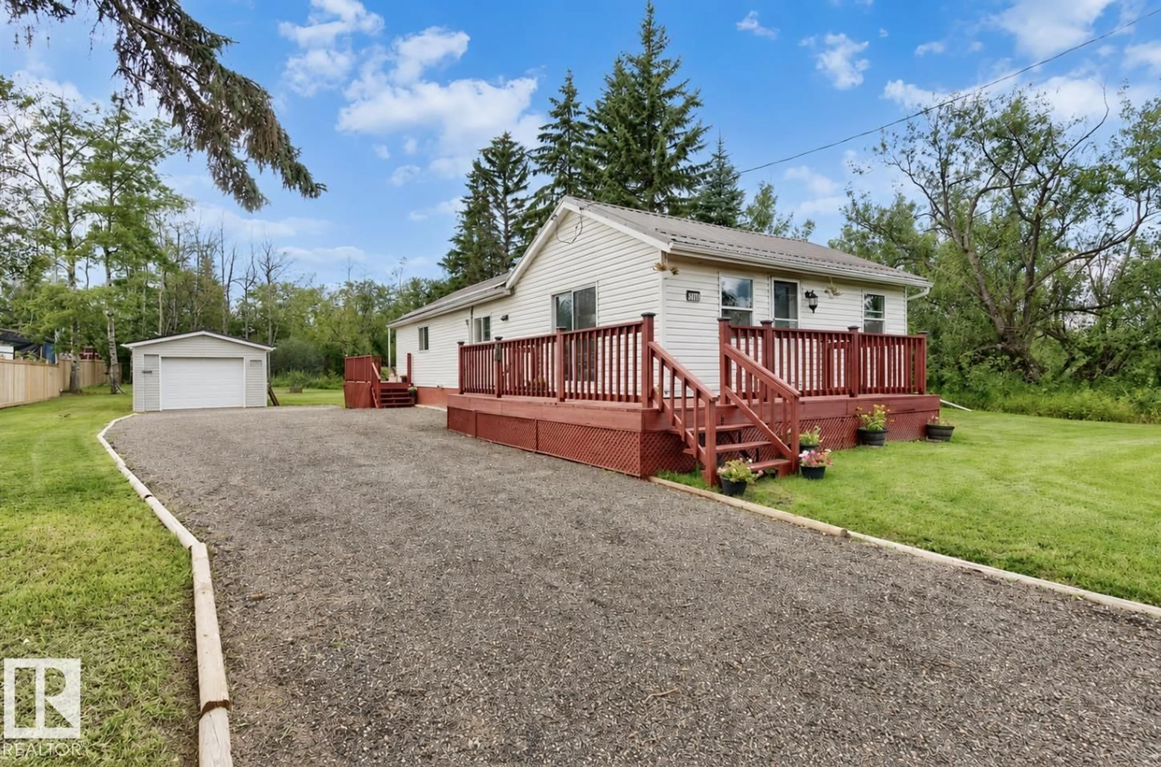 A pic from outside/outdoor area/front of a property/back of a property/a pic from drone, street for 5409 45 ST, Redwater Alberta T0A2W0