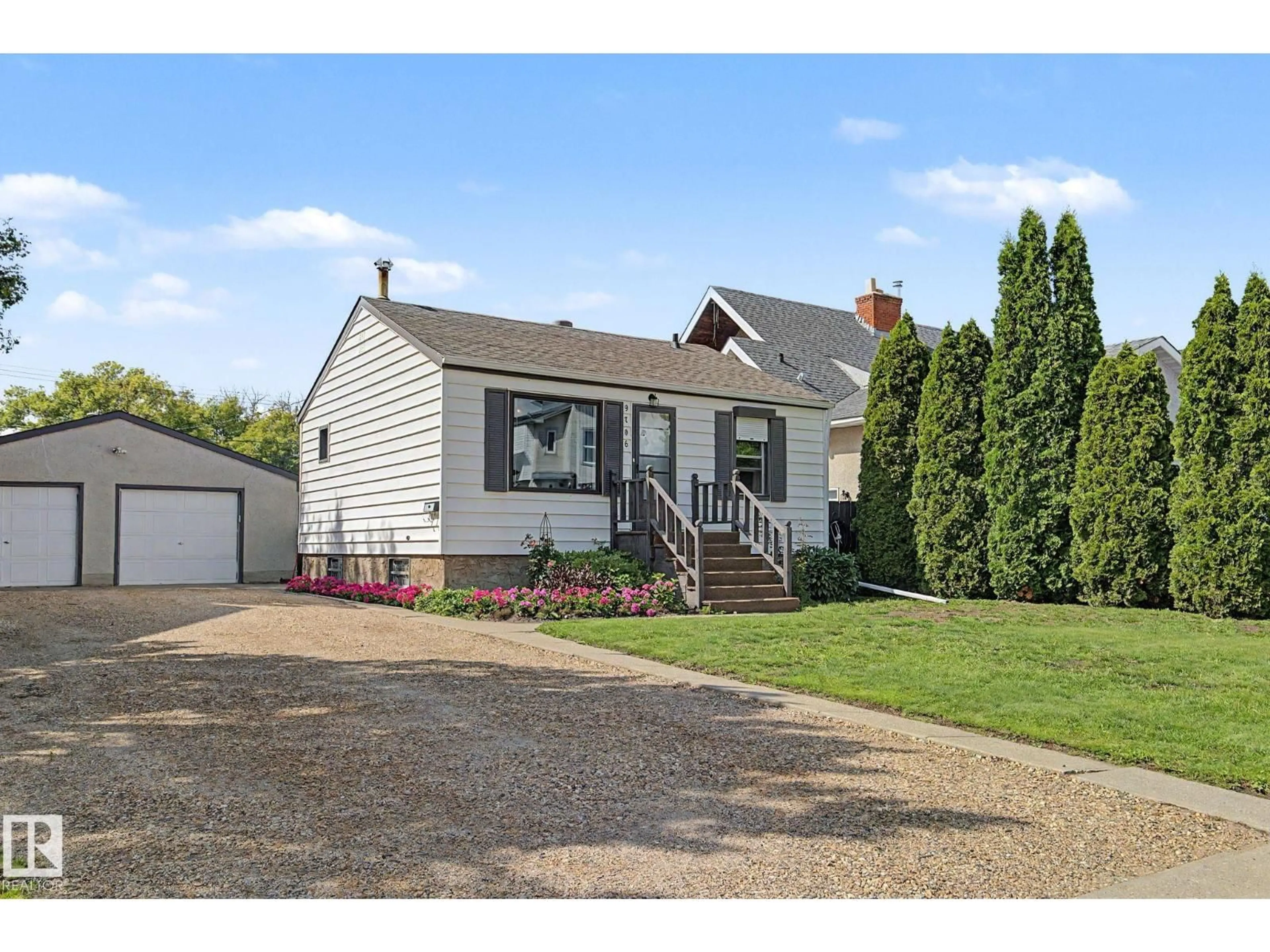 Home with vinyl exterior material, street for 9706 159 ST, Edmonton Alberta T5P2Z3