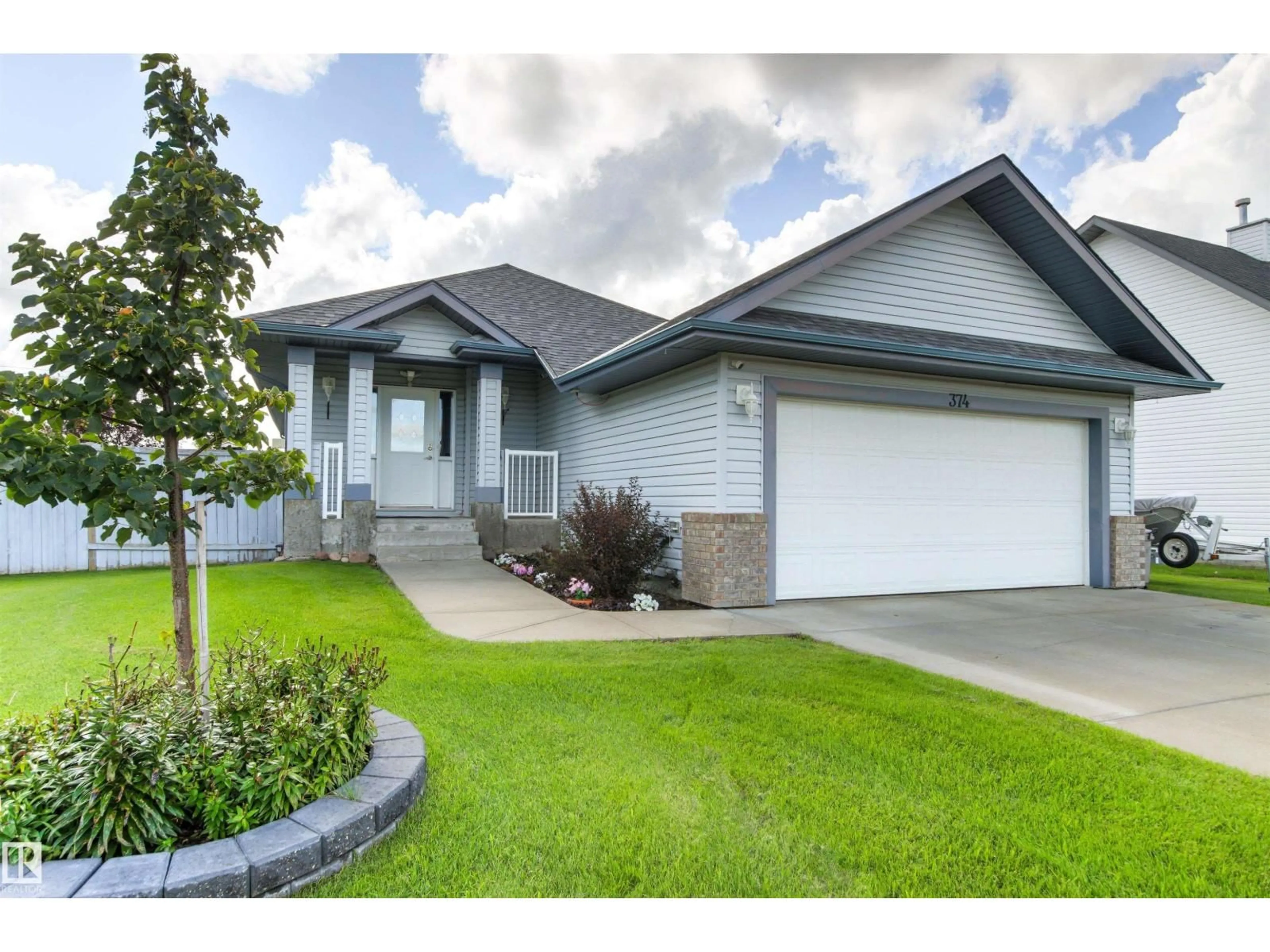 Home with vinyl exterior material, street for 374 PAQUIN ST, Cardiff Alberta T8R2G5