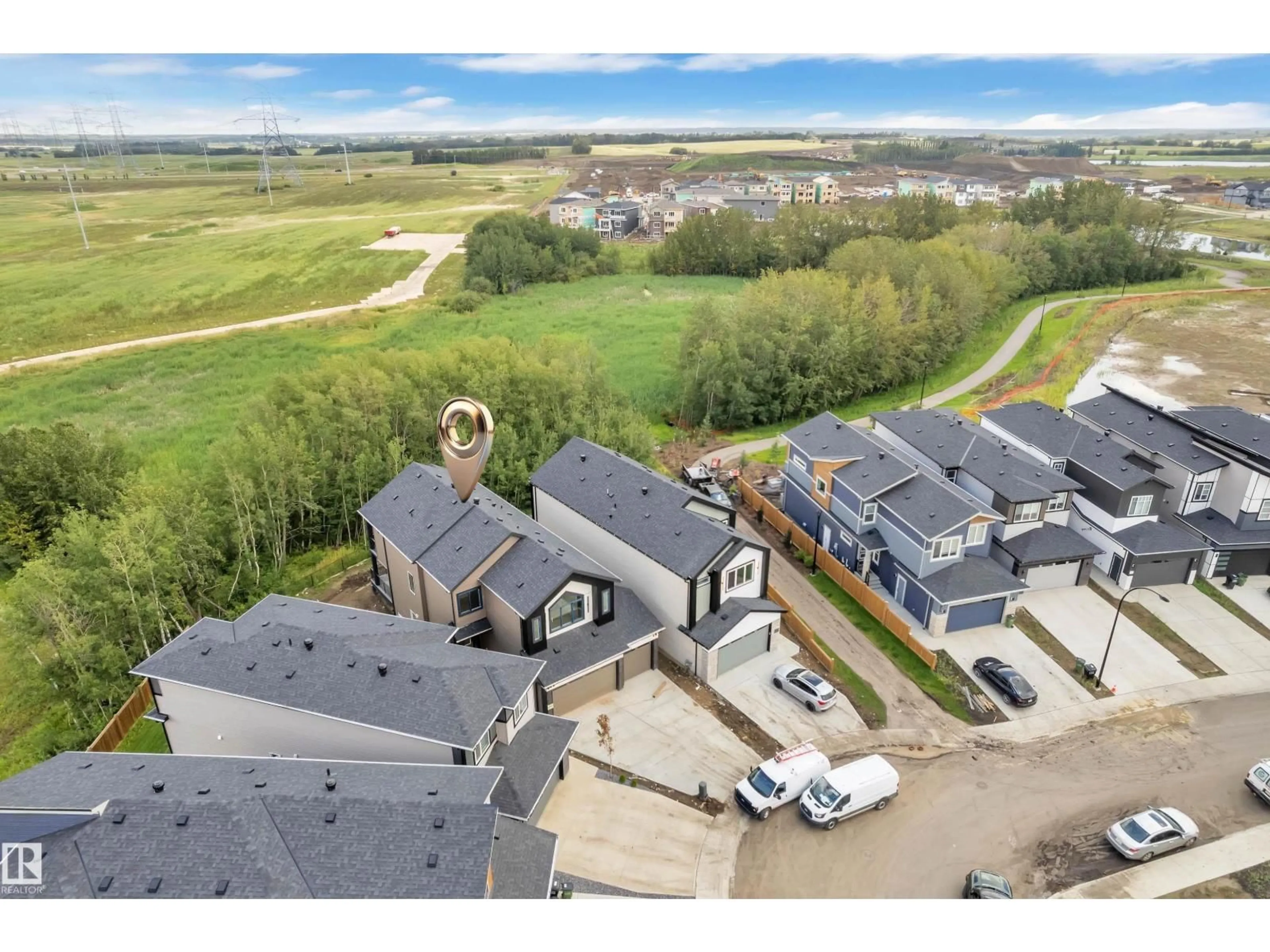 A pic from outside/outdoor area/front of a property/back of a property/a pic from drone, mountain view for 2408 1 AV, Edmonton Alberta T6X3K4