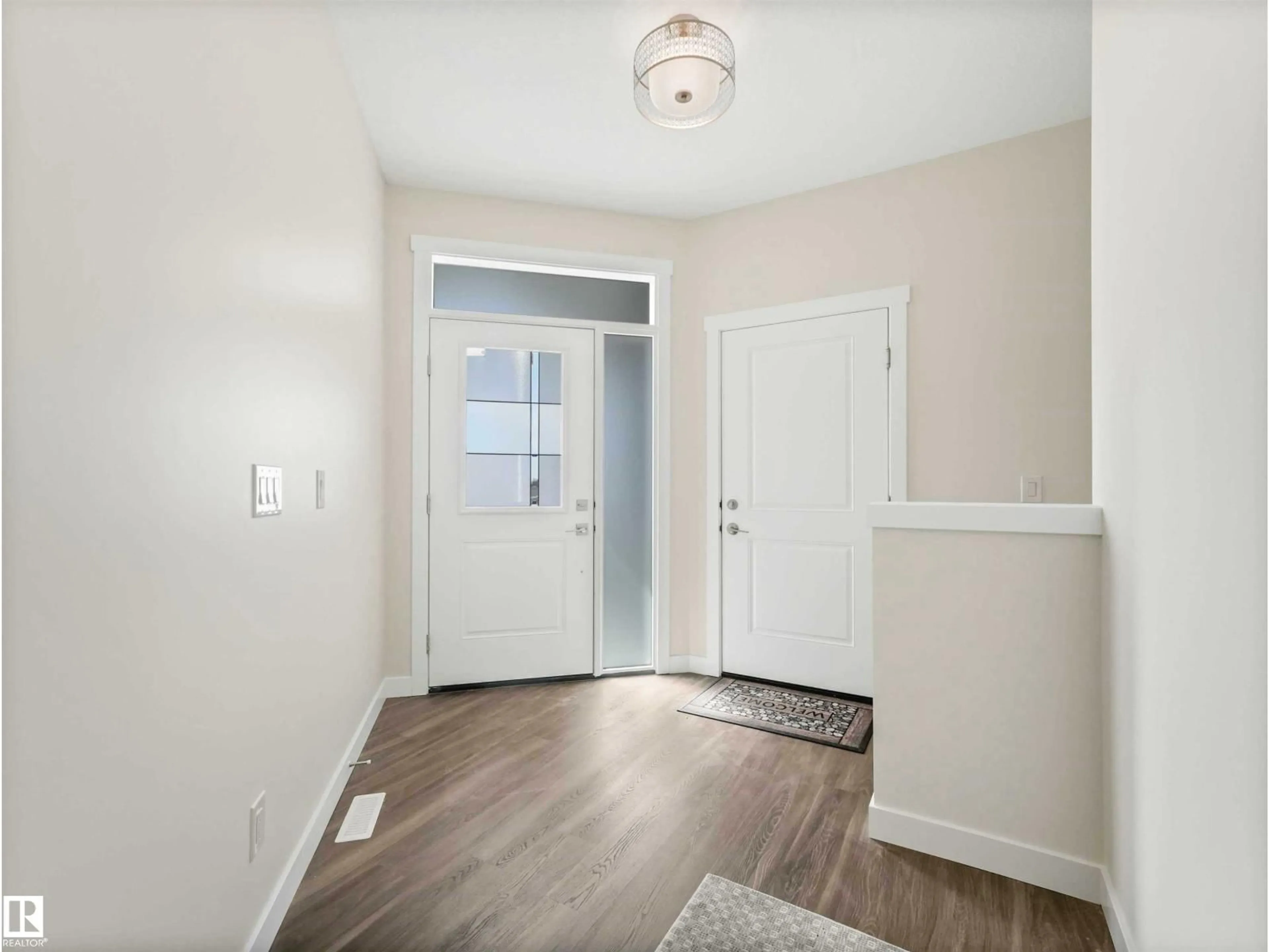 Indoor entryway for 14 - 7800 94 ST, Morinville Alberta T8R2S3