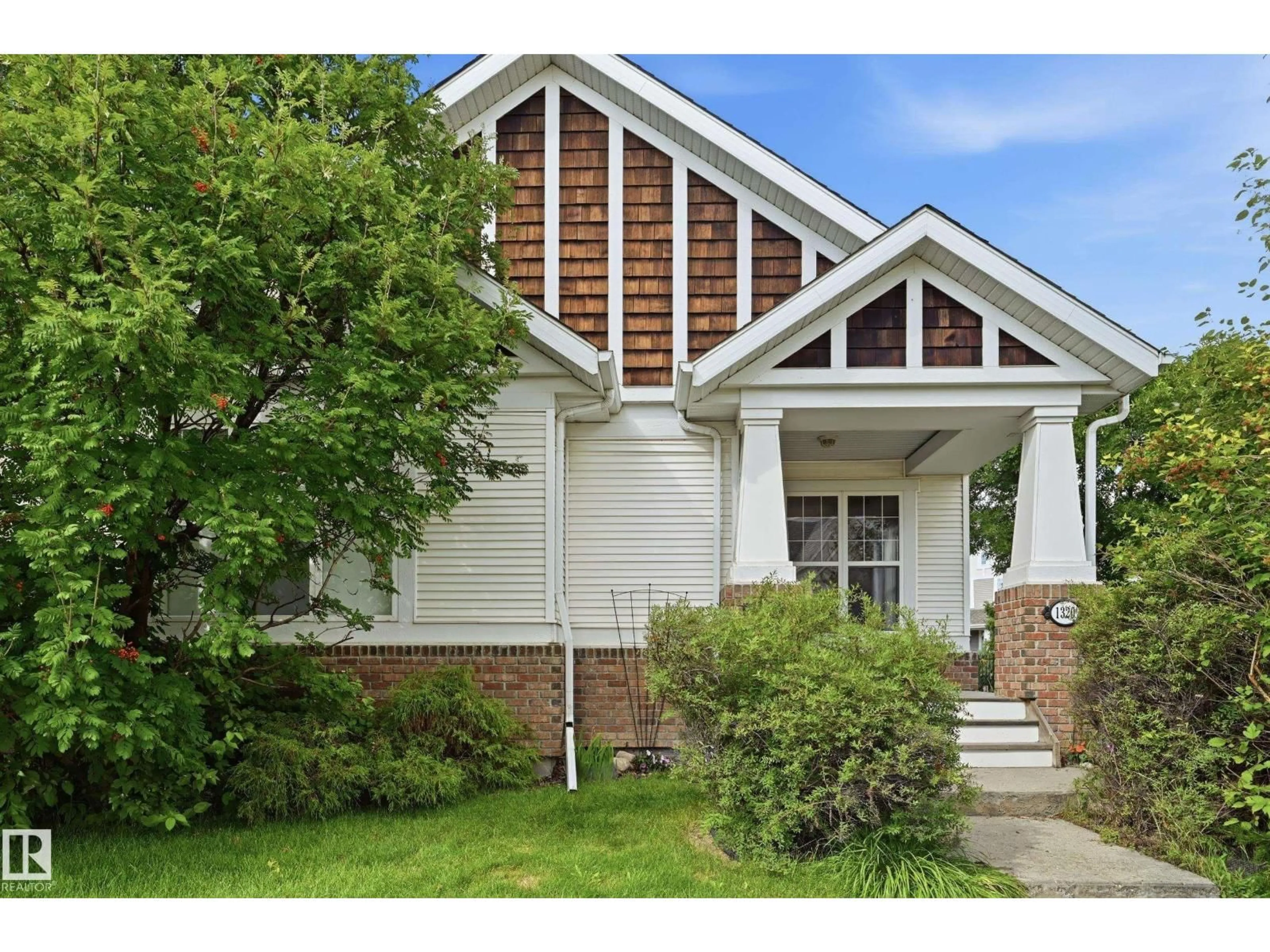 Home with brick exterior material, street for 1320 KAPYONG AV, Edmonton Alberta T5E0C3