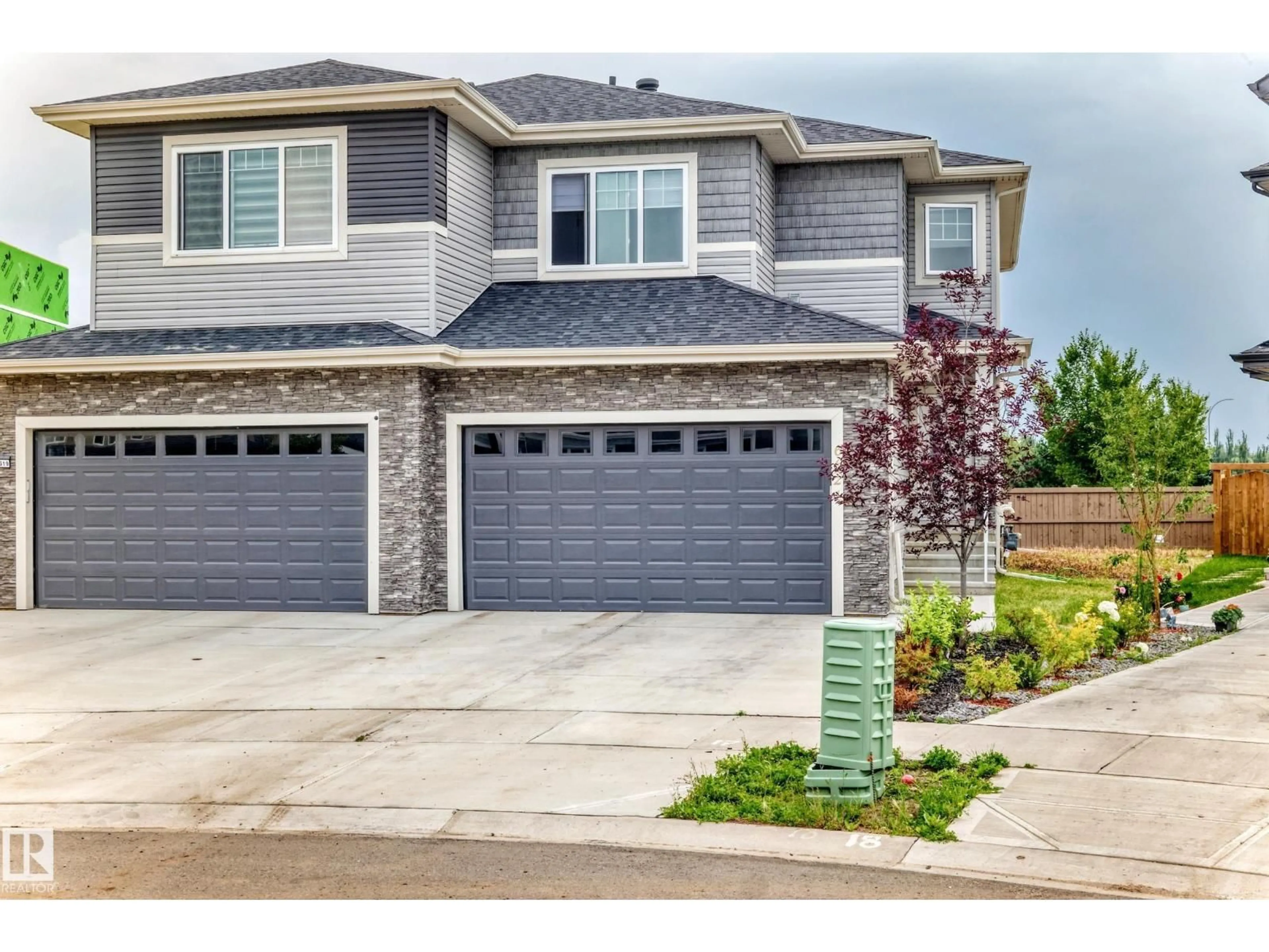 Home with vinyl exterior material, street for 6621 50 A AV, Beaumont Alberta T4X3A8