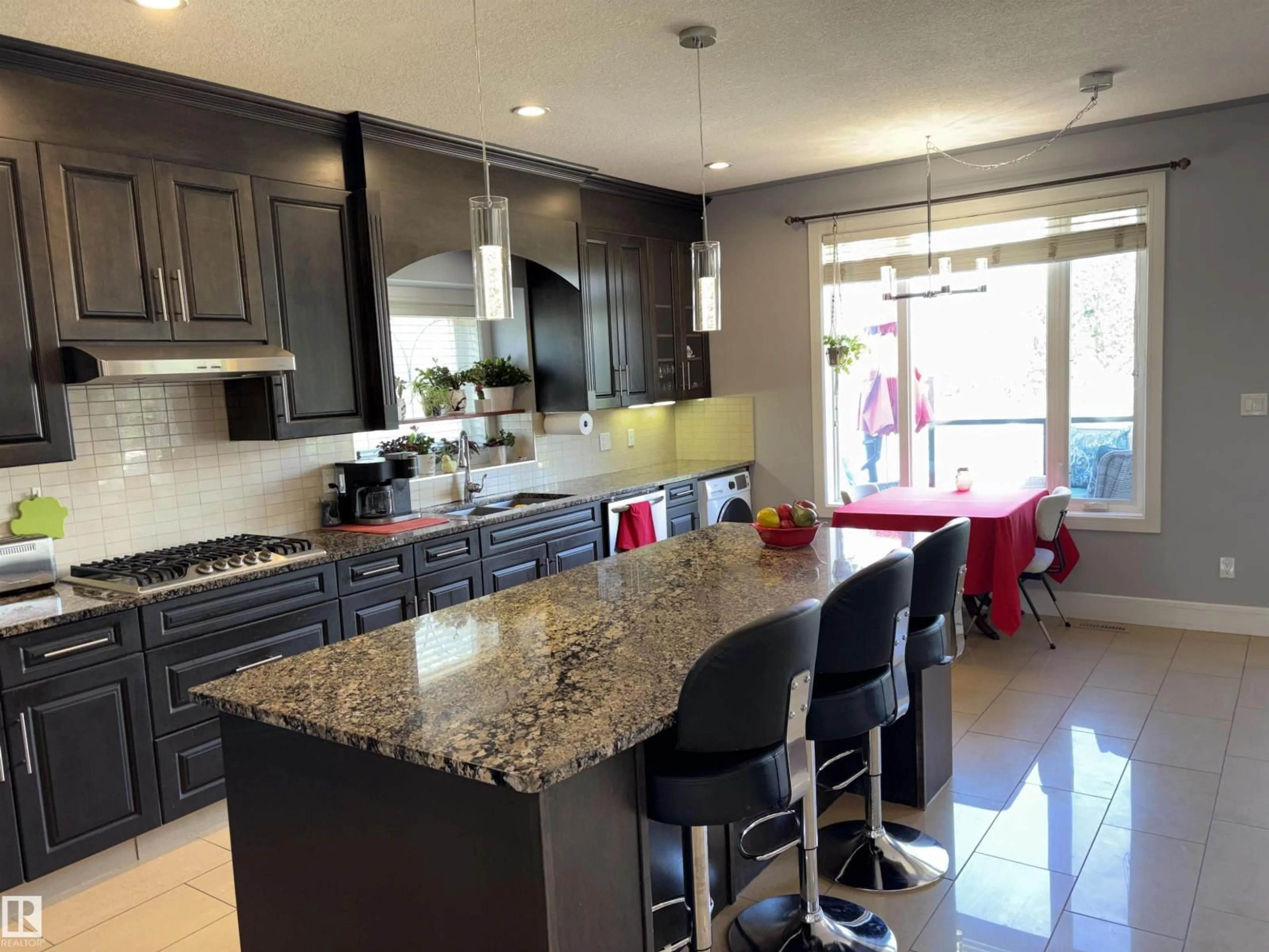 Open concept kitchen, ceramic/tile floor for 1452 36A AV, Edmonton Alberta T6T0J2
