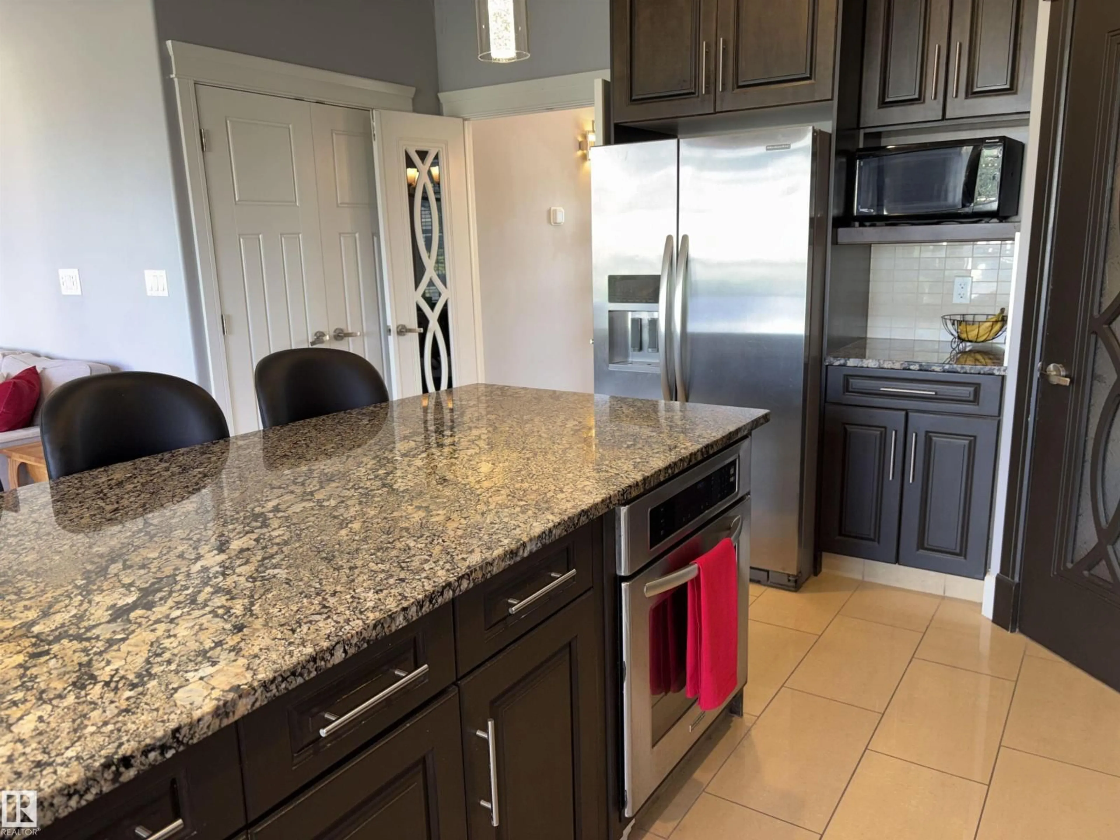 Open concept kitchen, ceramic/tile floor for 1452 36A AV, Edmonton Alberta T6T0J2