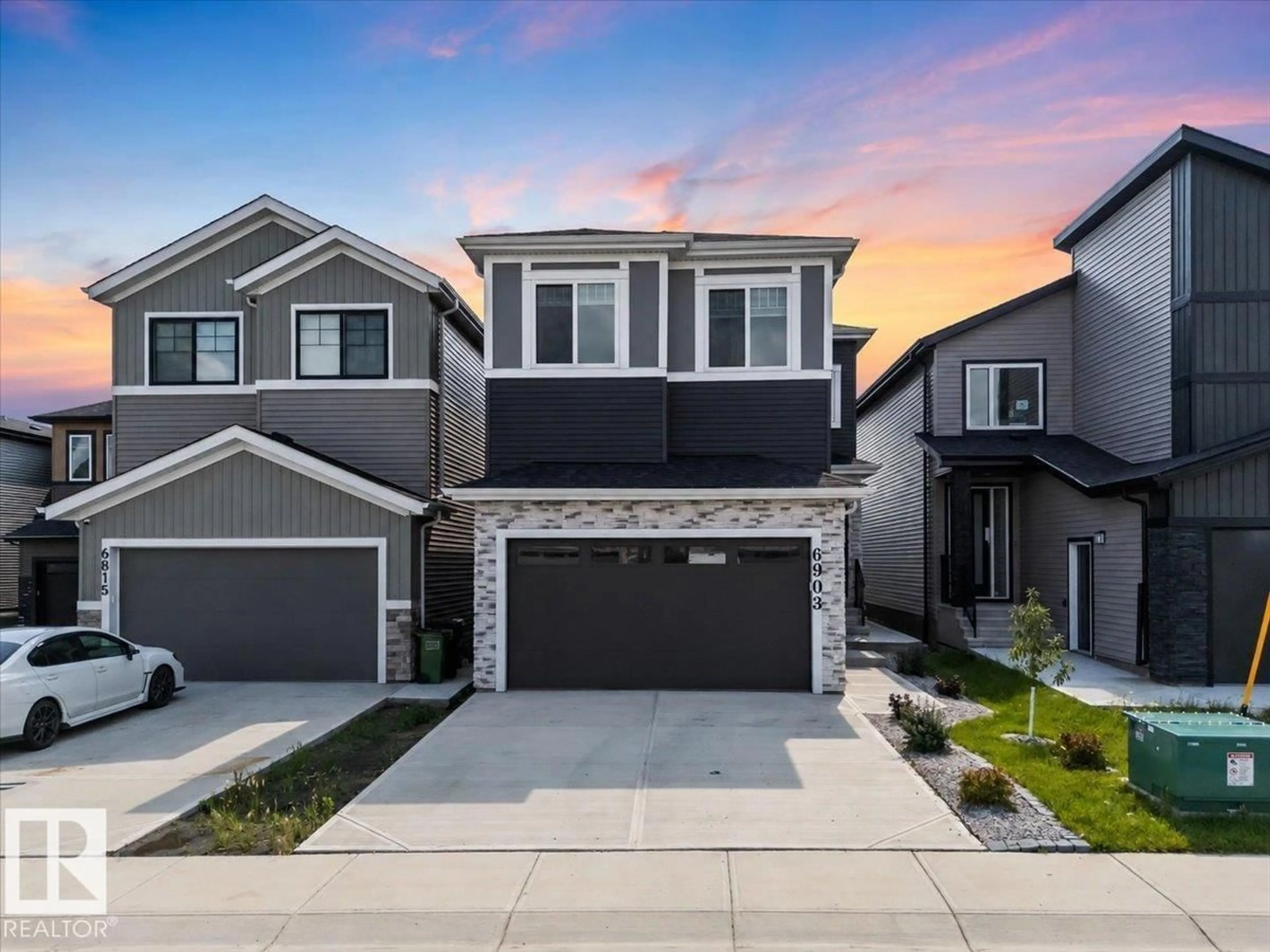 Home with vinyl exterior material, street for 6903 169 AV, Edmonton Alberta T5Z0H2