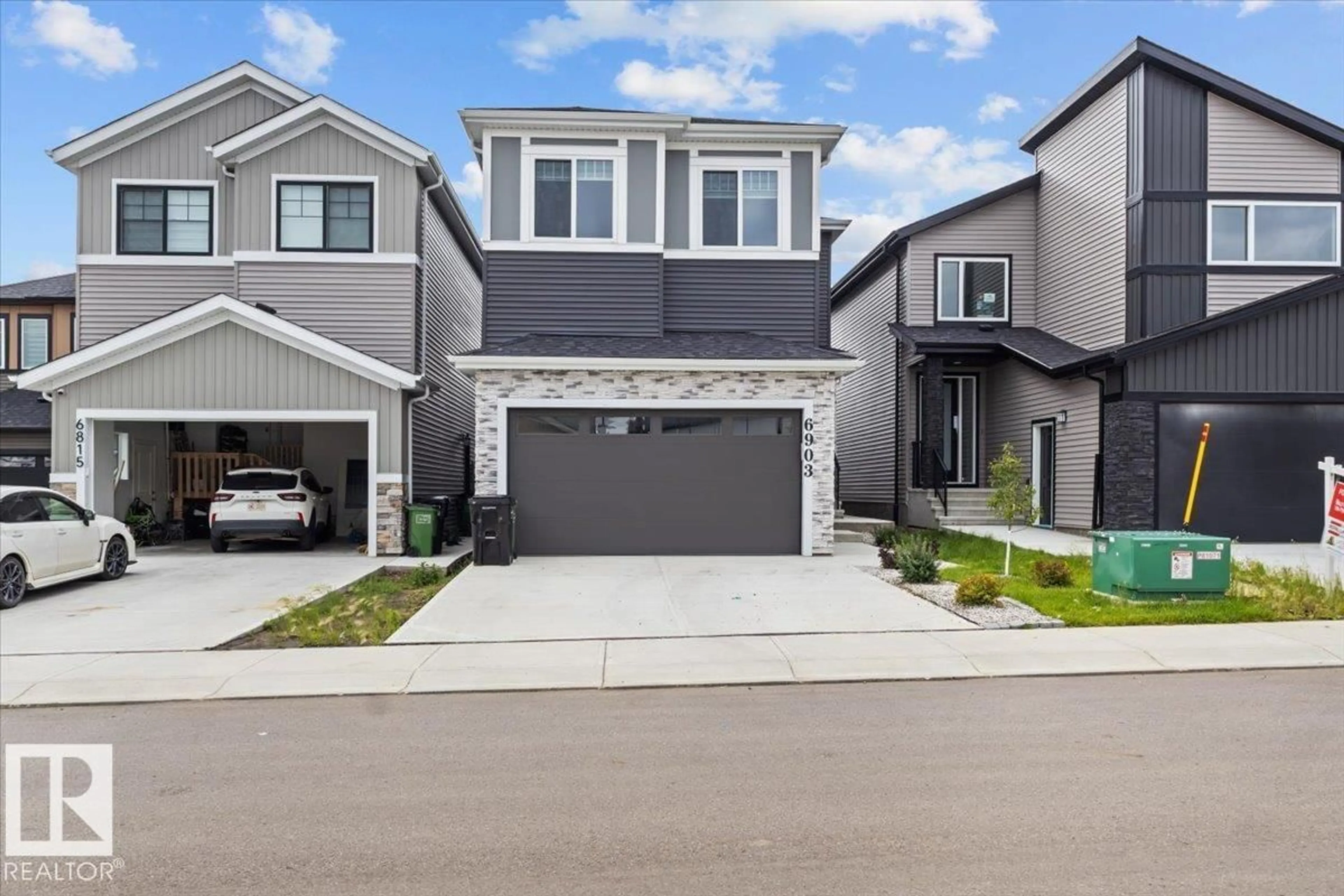 Home with vinyl exterior material, street for 6903 169 AV, Edmonton Alberta T5Z0H2