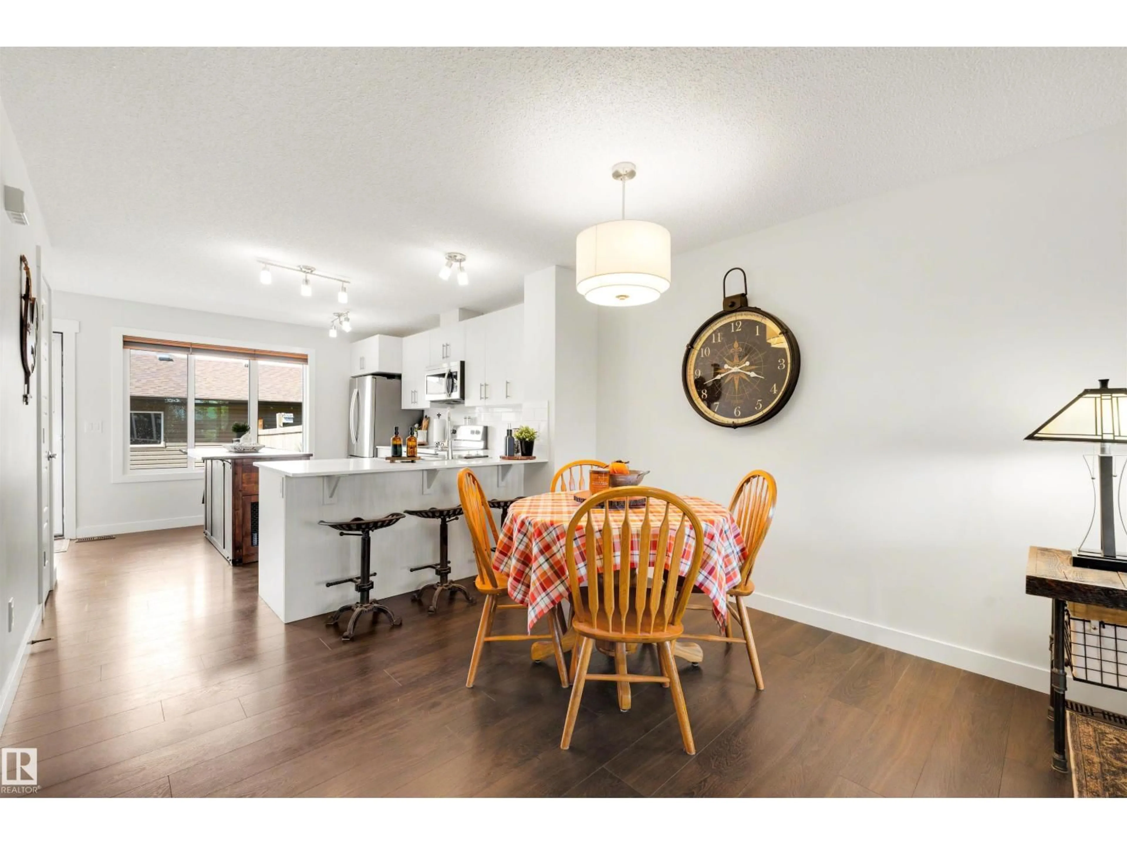 Open concept kitchen, wood/laminate floor for 354 CRYSTALLINA NERA DR, Edmonton Alberta T5Z0R9