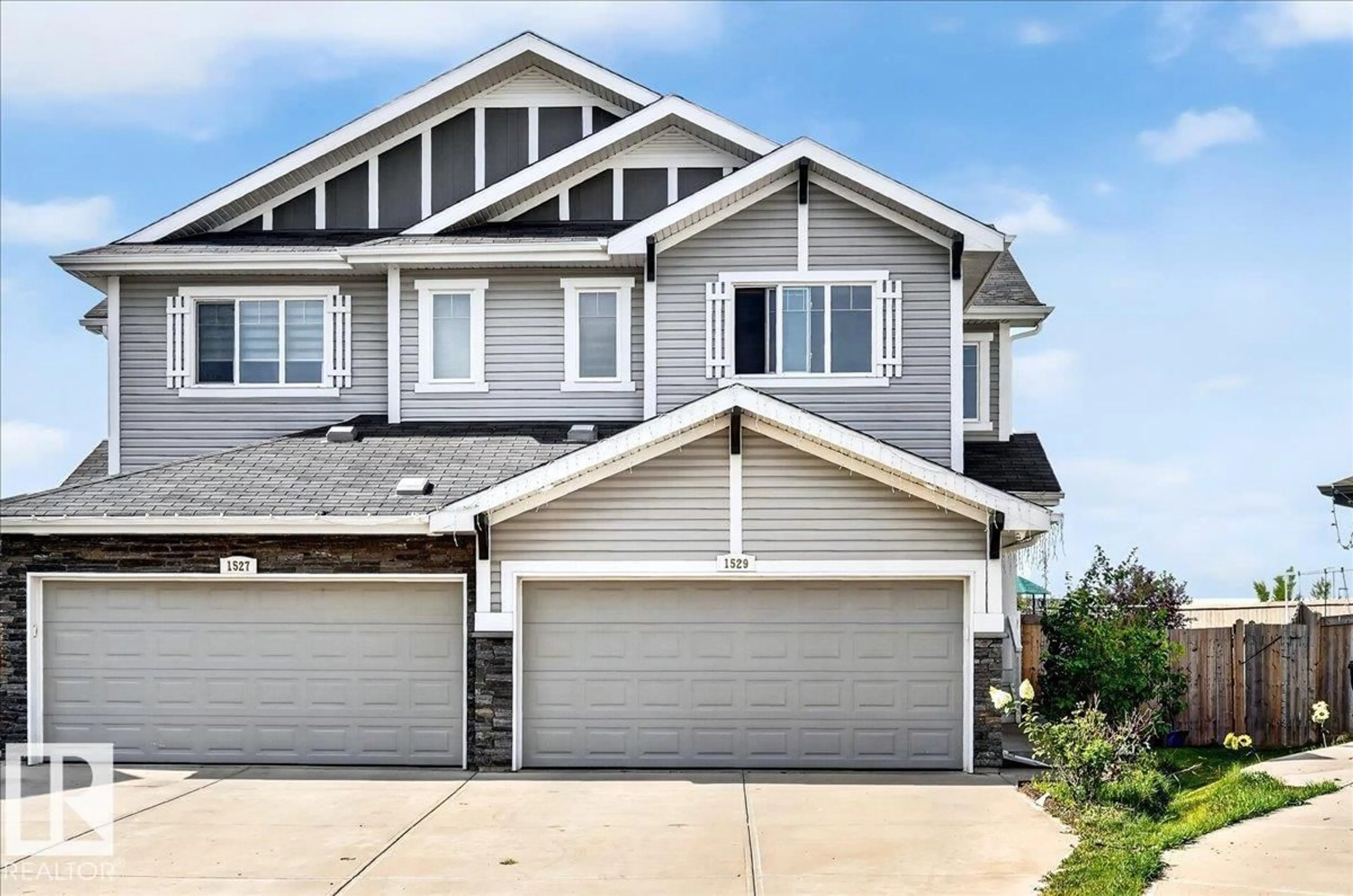 Home with vinyl exterior material, street for NW - 1529 26 AVE, Edmonton Alberta T6T0W2