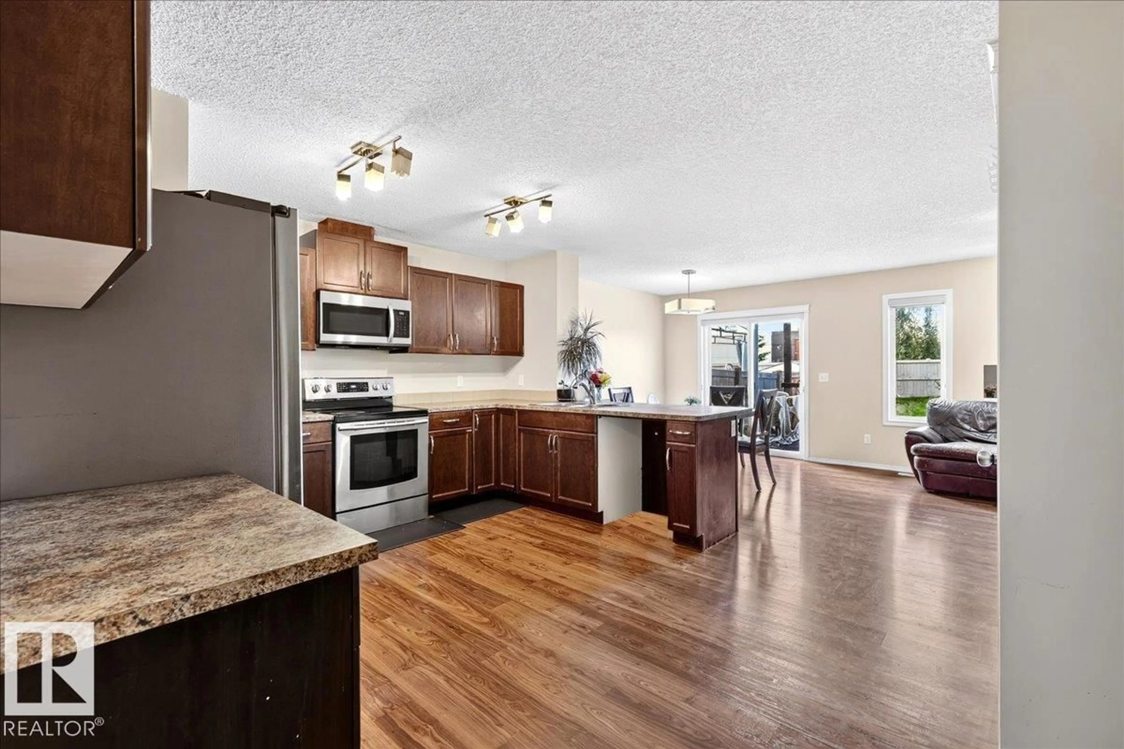 Open concept kitchen, unknown for NW - 1529 26 AVE, Edmonton Alberta T6T0W2