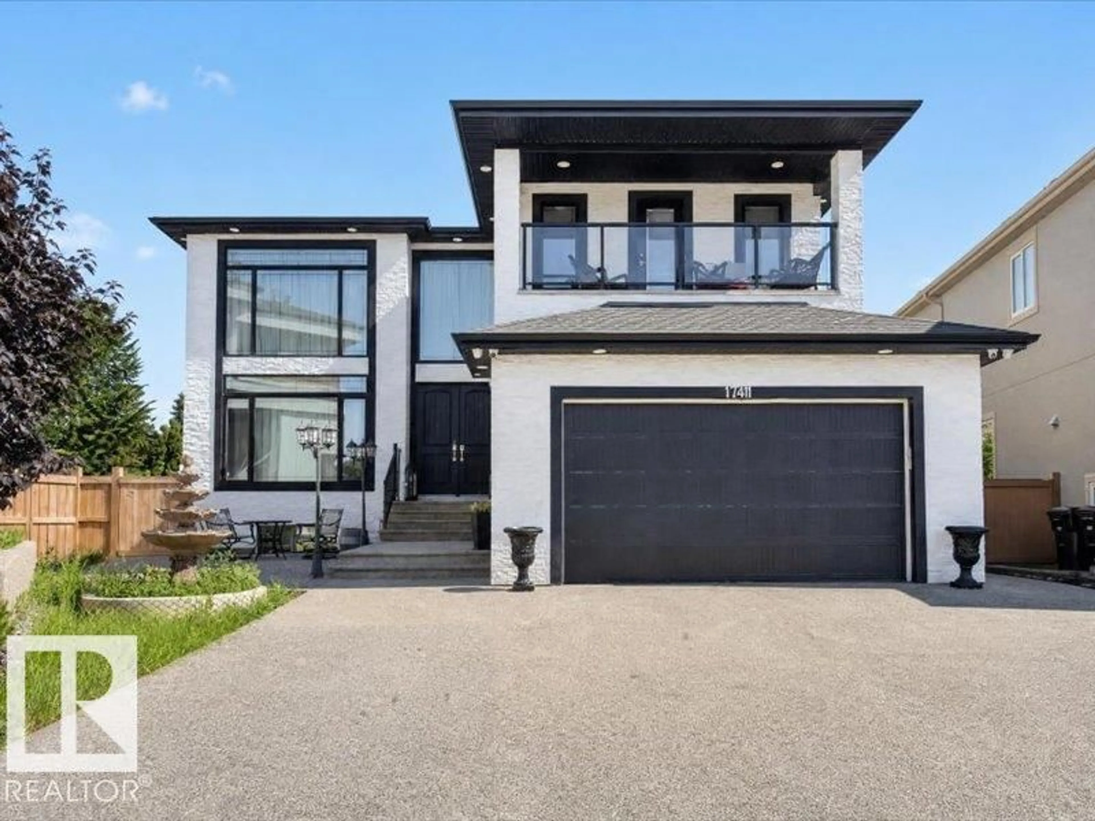 Home with vinyl exterior material, street for 17411 106 ST, Edmonton Alberta T5X0E3