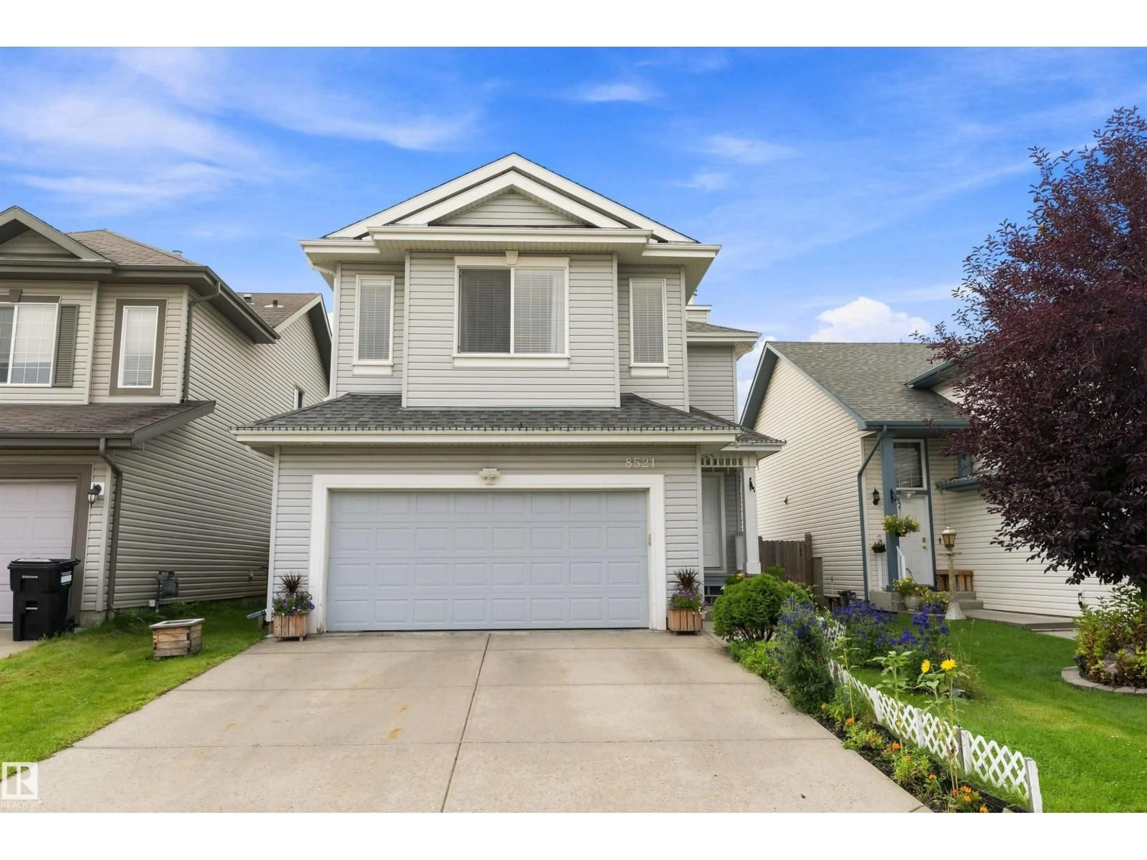 Home with vinyl exterior material, street for SW - 8521 8 AV, Edmonton Alberta T6X1G6
