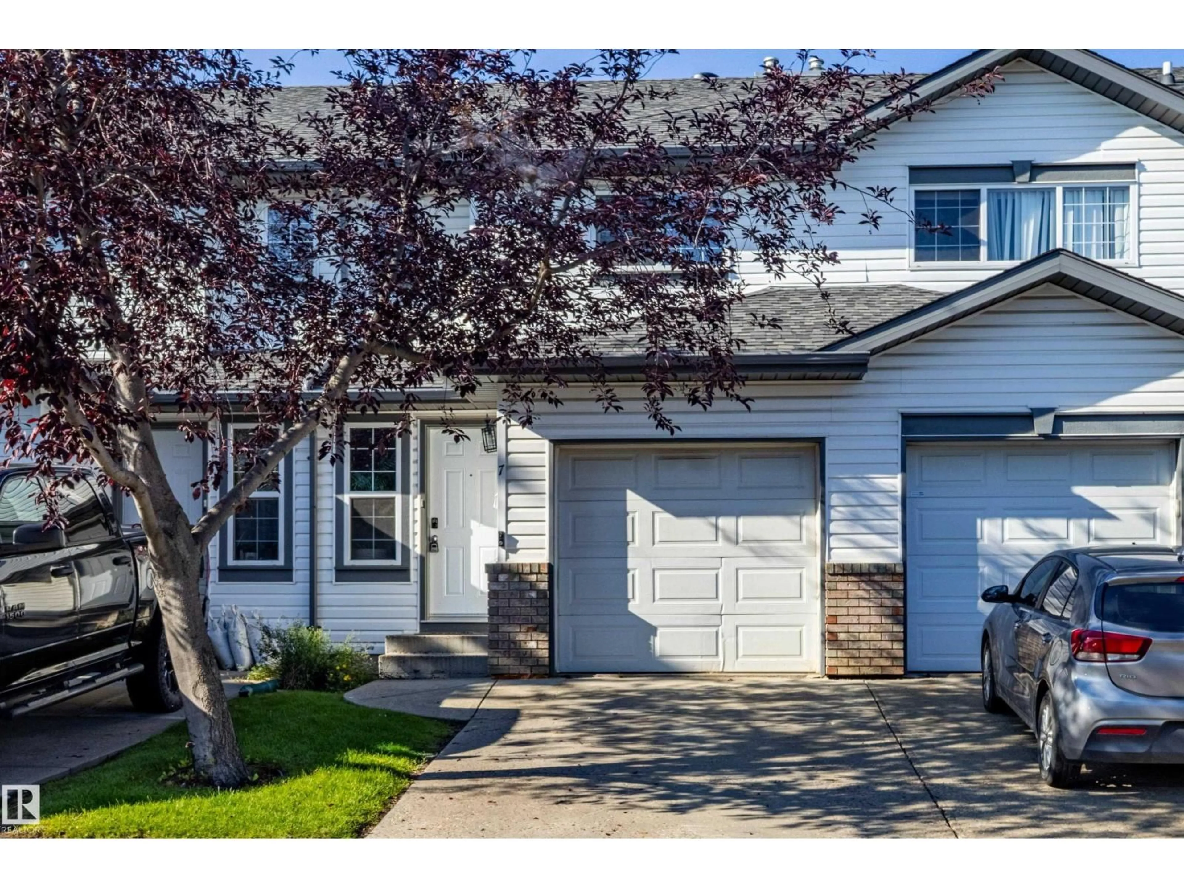 Home with vinyl exterior material, street for #7 - 16823 84 ST, Edmonton Alberta T5Z3S4