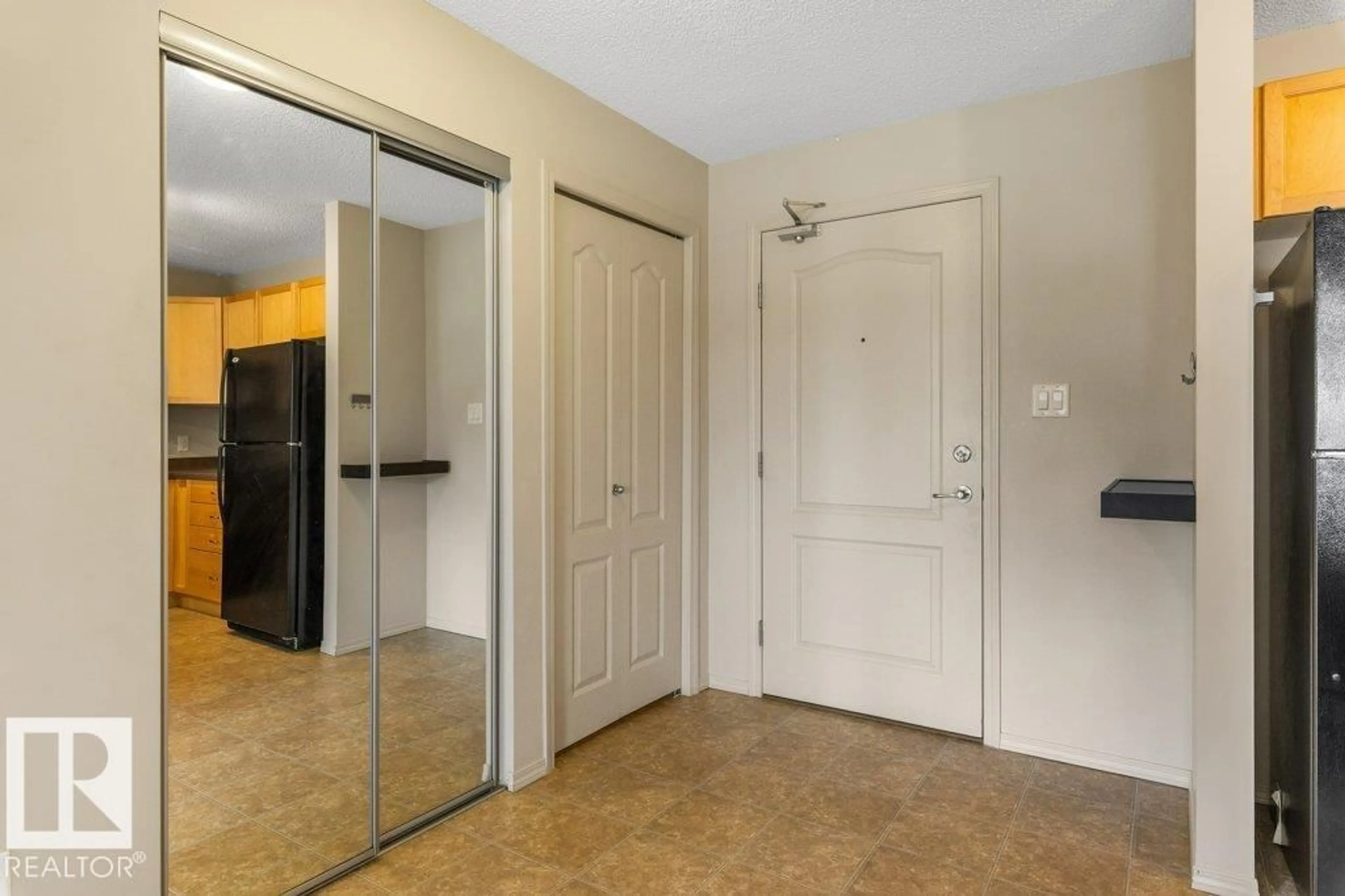 Indoor entryway for #203 - 5951 165 AV, Edmonton Alberta T5Y0J6