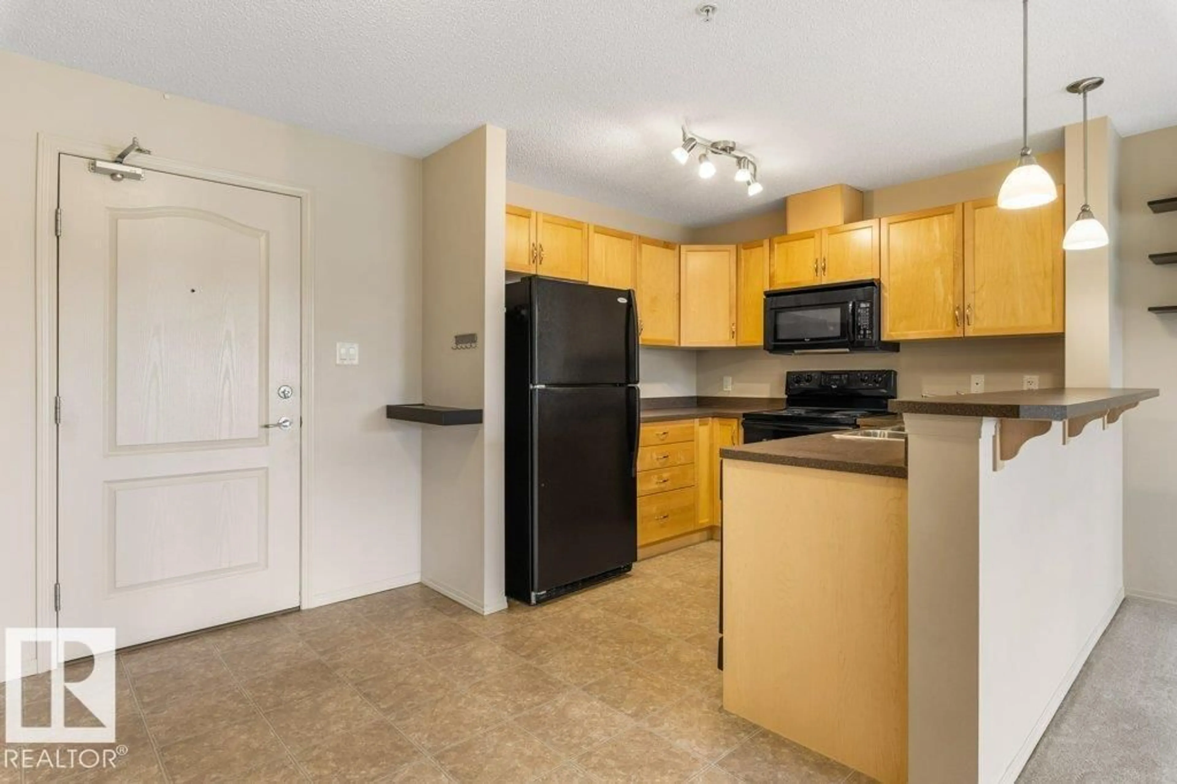 Standard kitchen, unknown for #203 - 5951 165 AV, Edmonton Alberta T5Y0J6