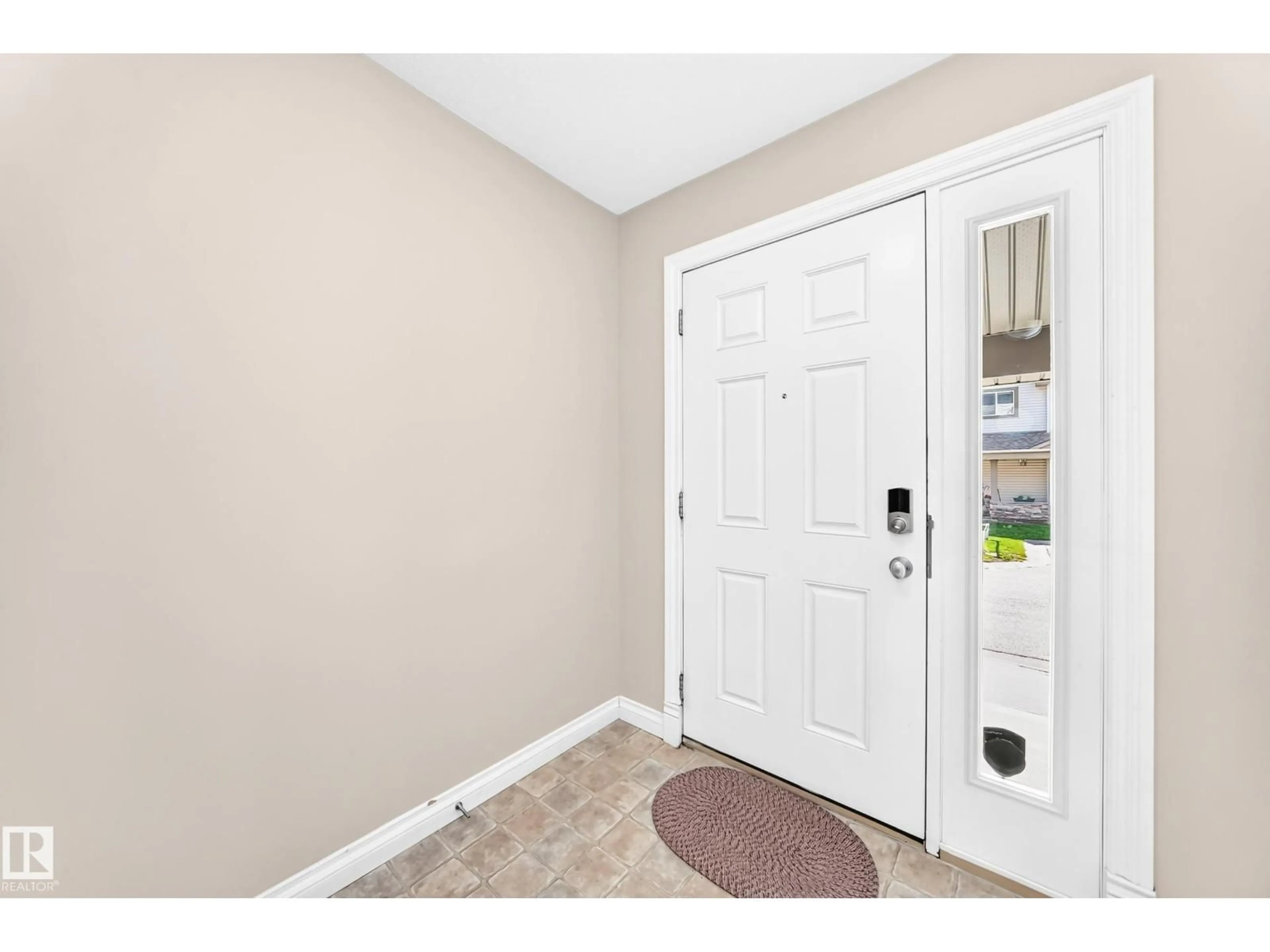 Indoor entryway for 54 12050 17 AV SW, Edmonton Alberta T6W1X4