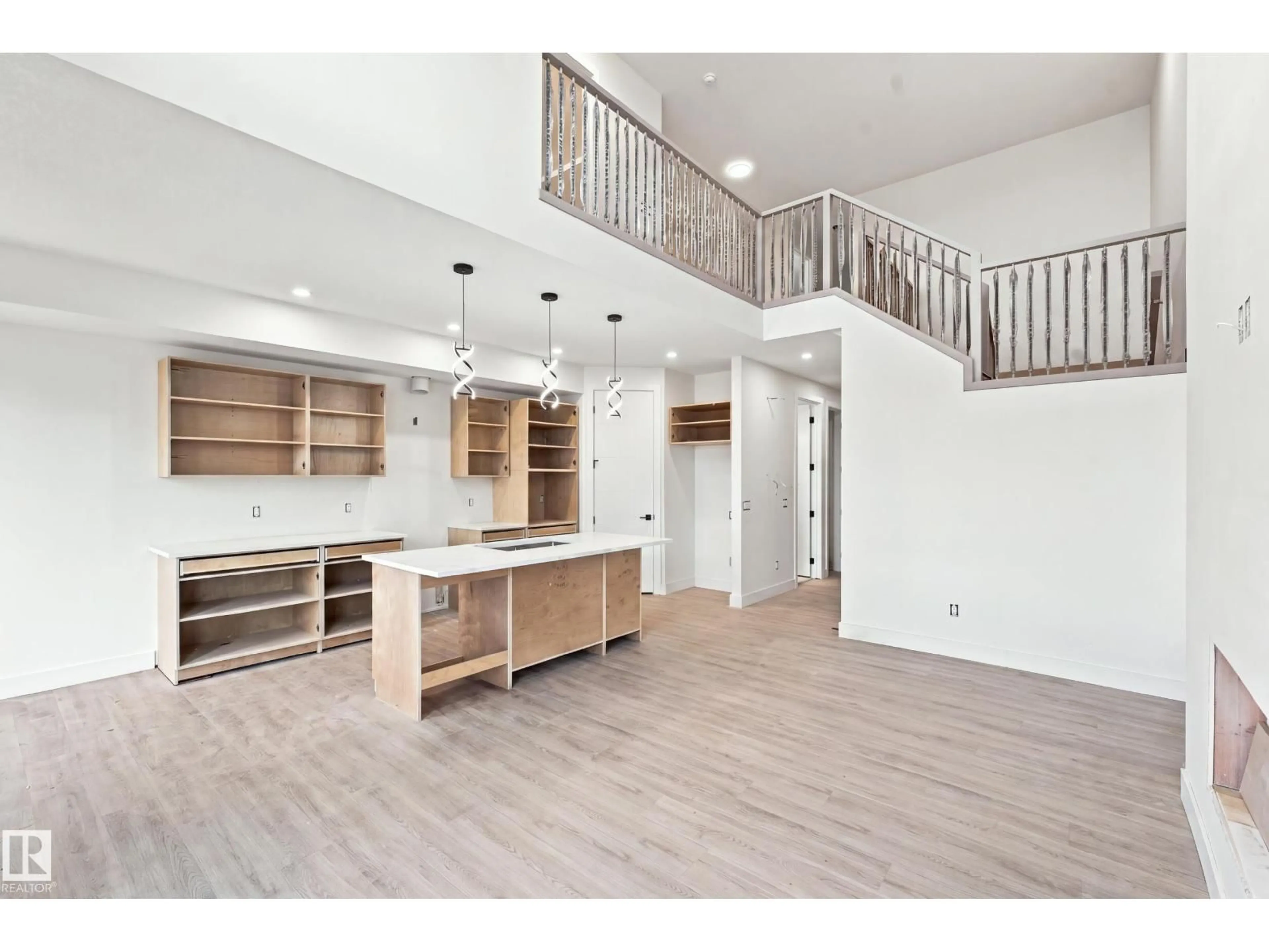 Open concept kitchen, wood/laminate floor for NW - 1818 155 AV, Edmonton Alberta T5Y4H8