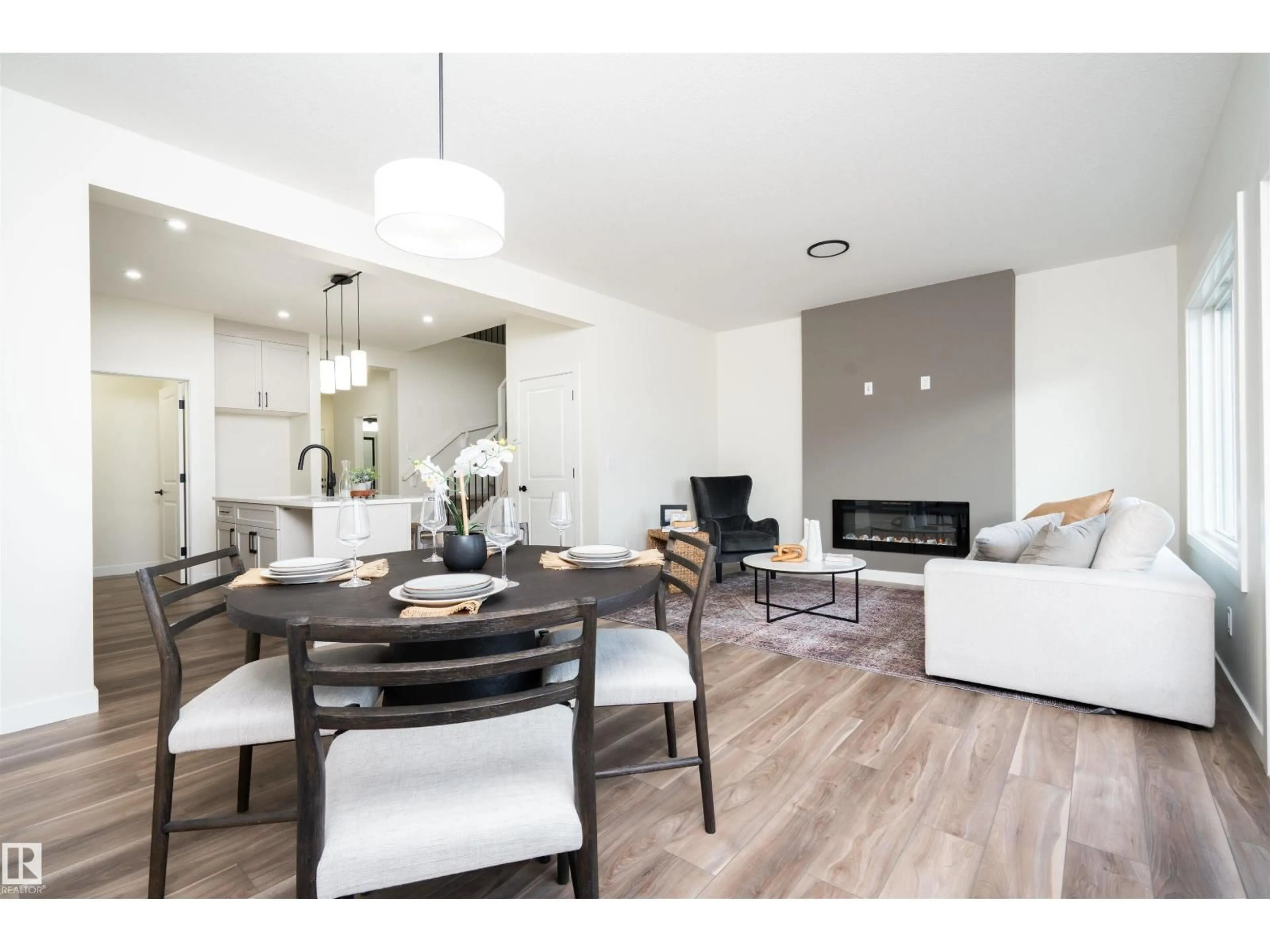 Open concept kitchen, wood/laminate floor for 2623 5 AV, Edmonton Alberta T6X3J1