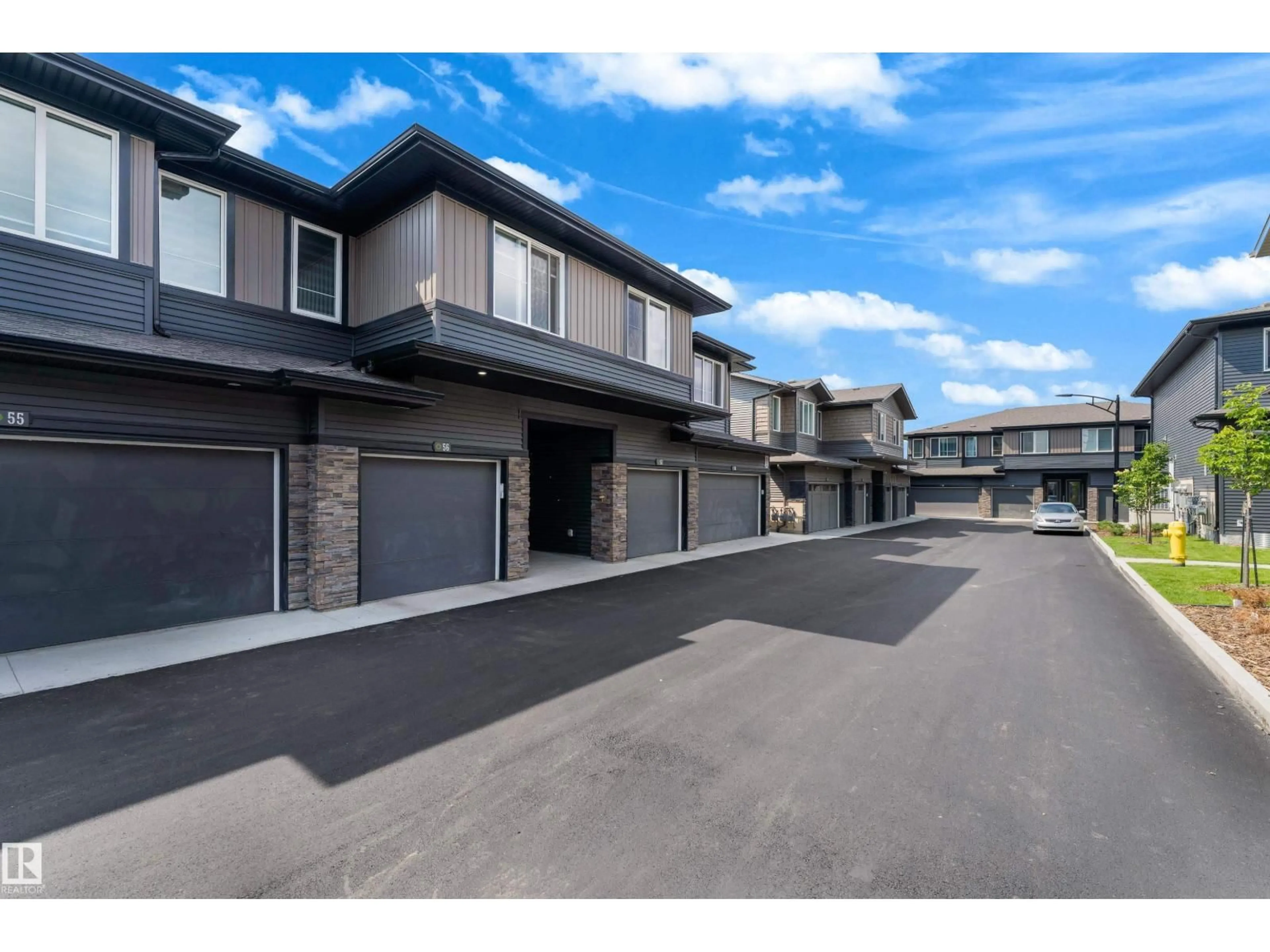A pic from outside/outdoor area/front of a property/back of a property/a pic from drone, street for #56 - 2710 66 ST, Edmonton Alberta T6X3H4
