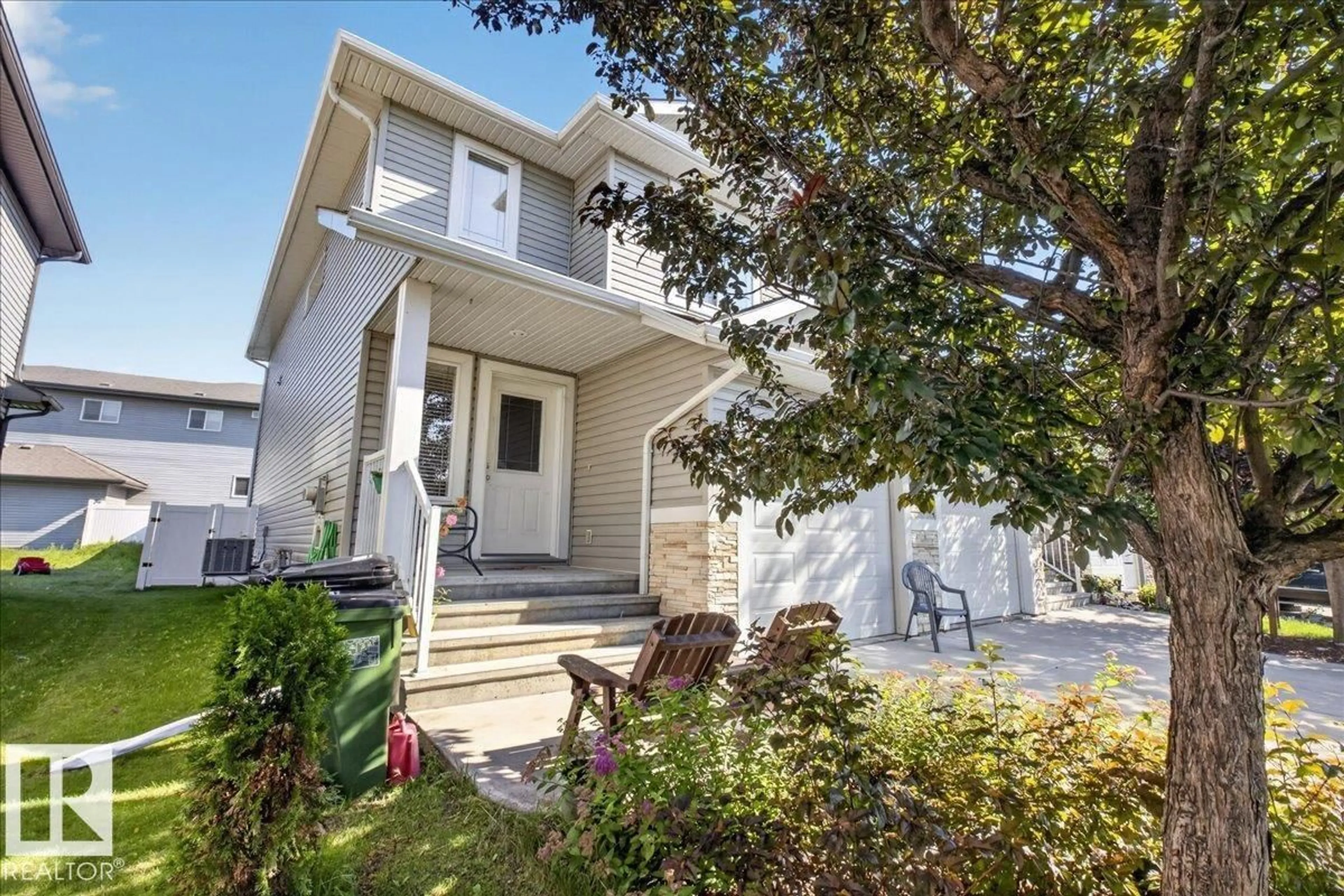 Home with vinyl exterior material, street for NW - 5110 168A AV, Edmonton Alberta T5Y0R9