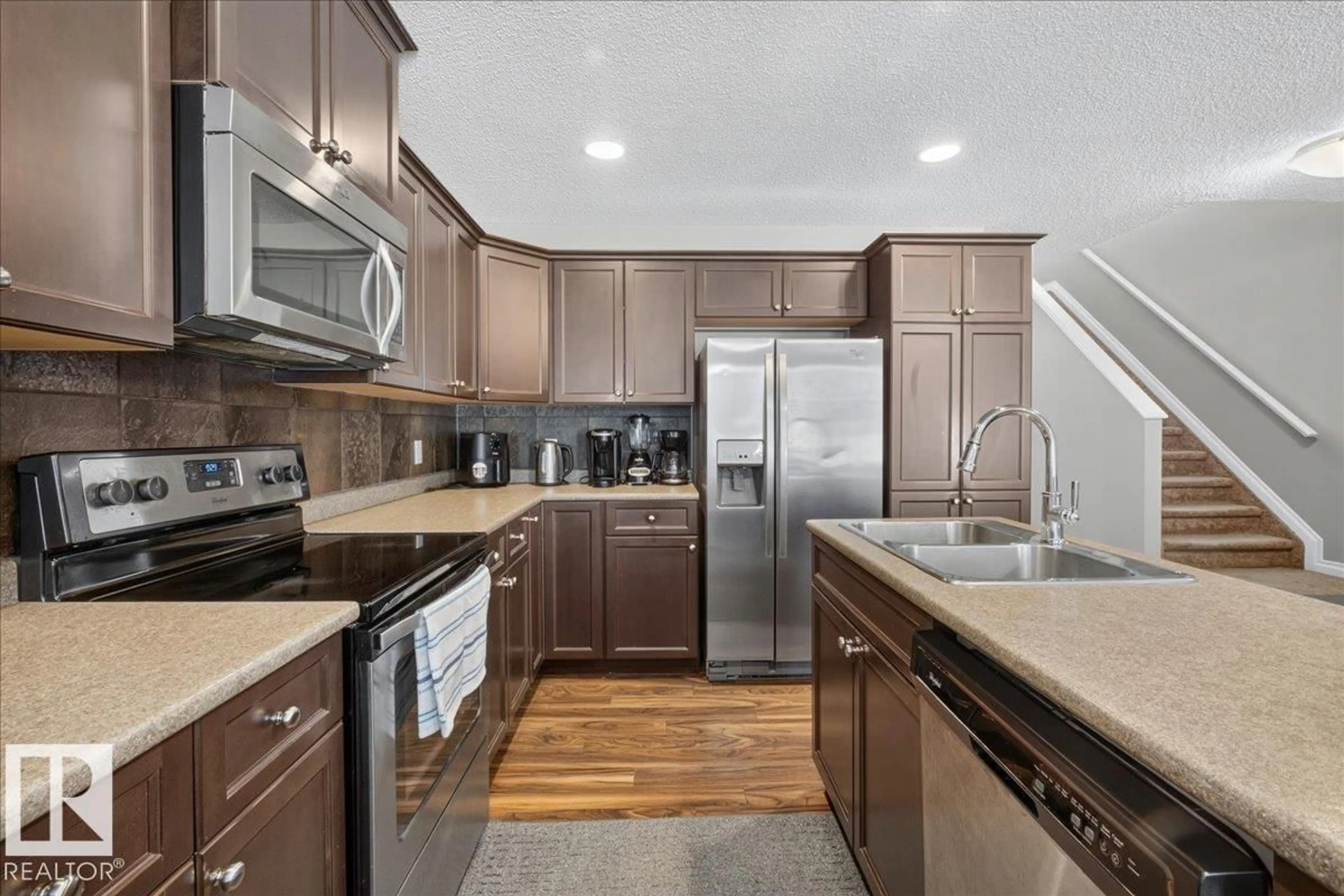 Open concept kitchen, ceramic/tile floor for NW - 5110 168A AV, Edmonton Alberta T5Y0R9
