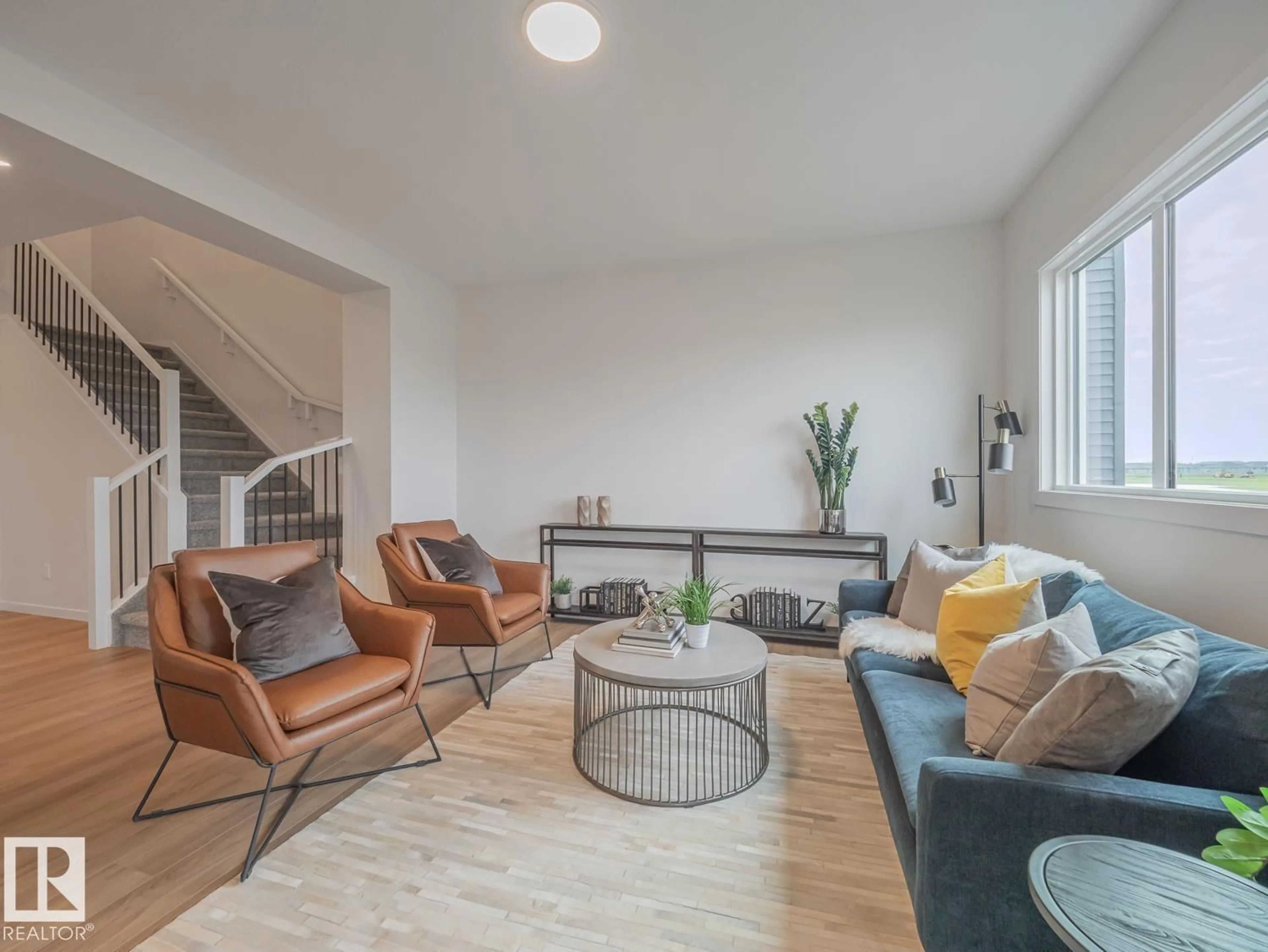 Living room with furniture, unknown for NE - 17735 7 ST, Edmonton Alberta T5Y4K3
