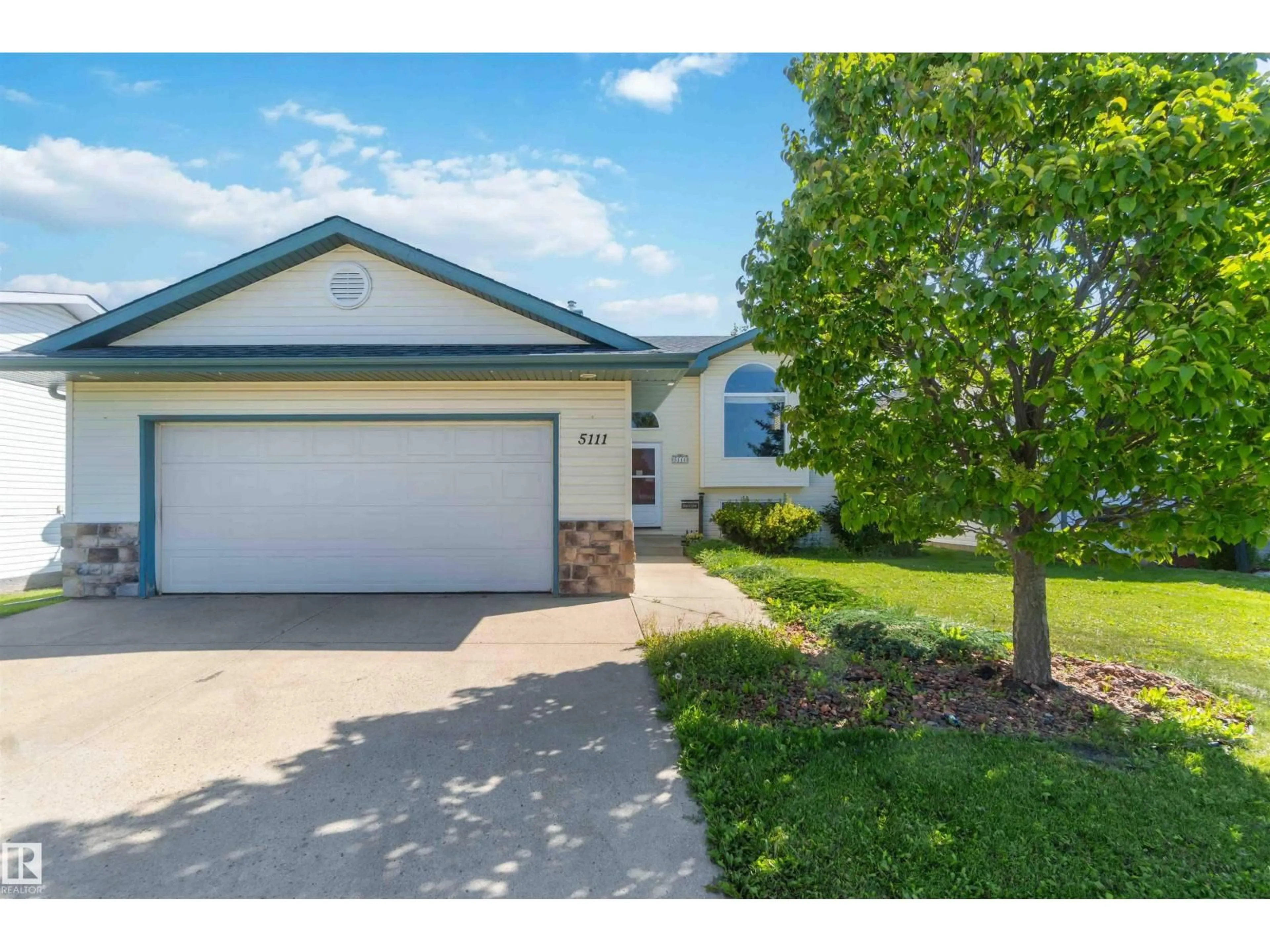 Home with vinyl exterior material, street for 5111 52 ST, Legal Alberta T0G1L0