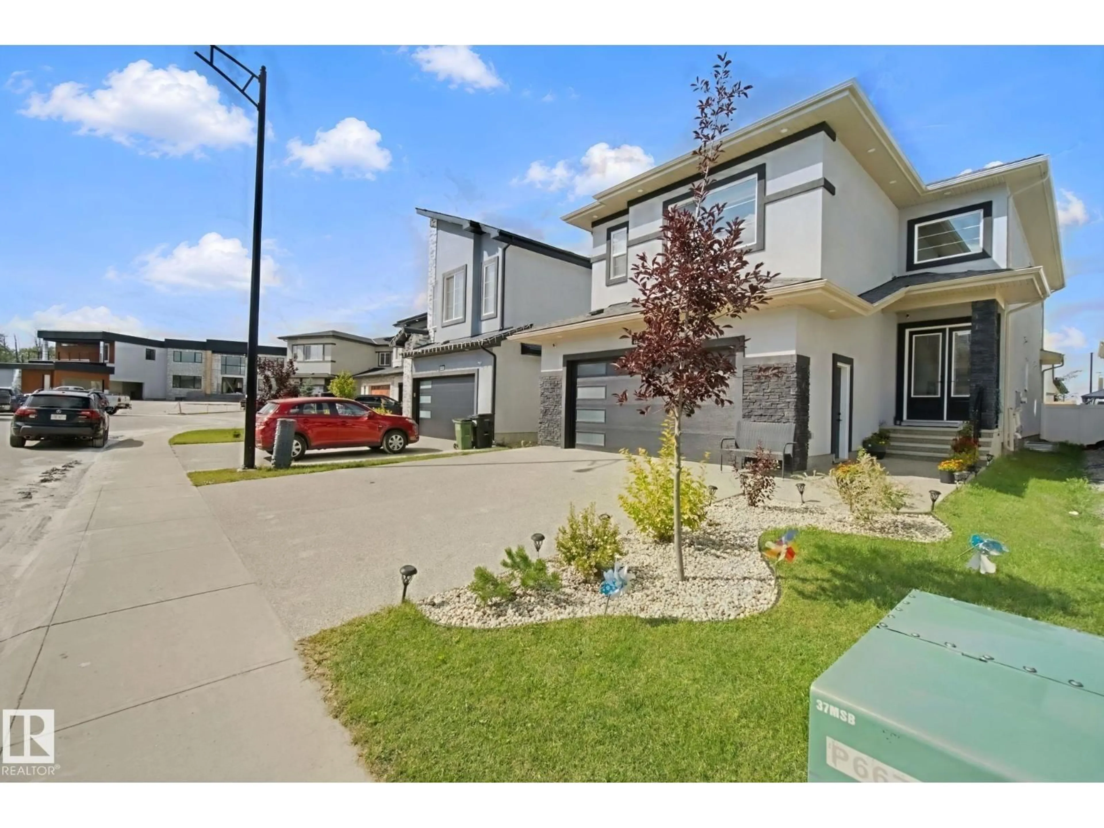 A pic from outside/outdoor area/front of a property/back of a property/a pic from drone, street for NW - 4820 174 AV, Edmonton Alberta T5Y4C7
