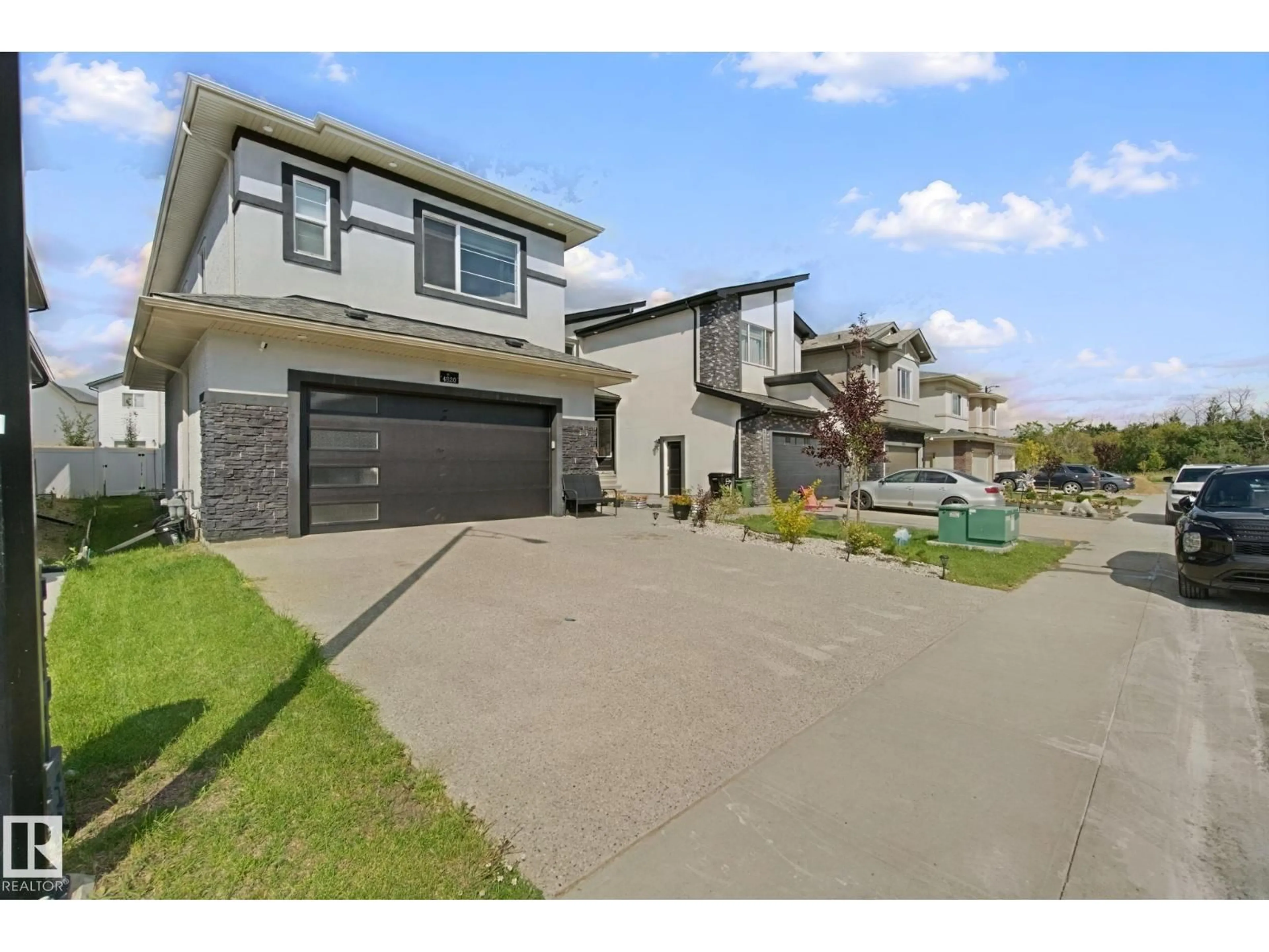 A pic from outside/outdoor area/front of a property/back of a property/a pic from drone, street for NW - 4820 174 AV, Edmonton Alberta T5Y4C7