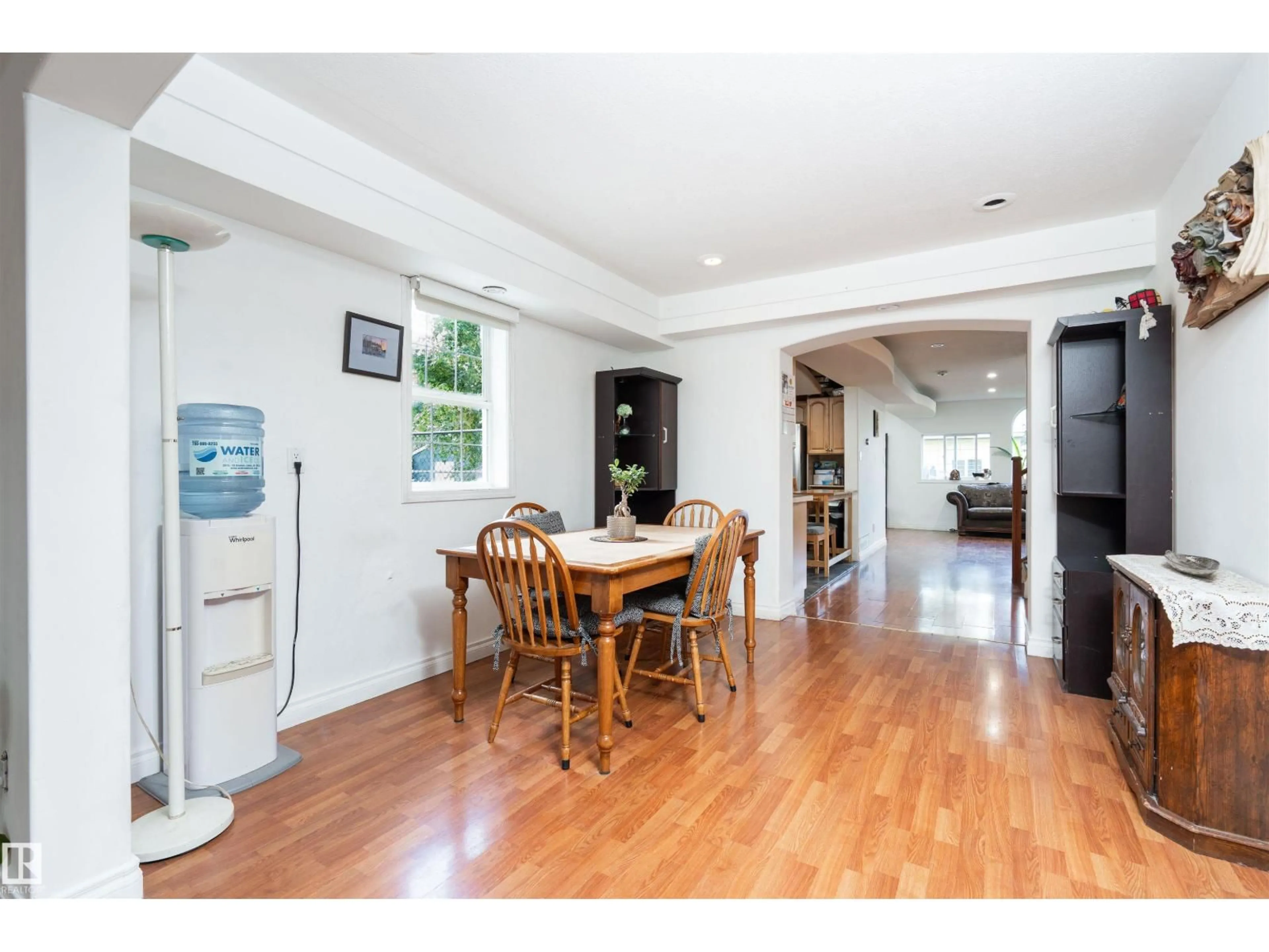 Dining room, wood/laminate floor for 11918 42 ST, Edmonton Alberta T5W2N6