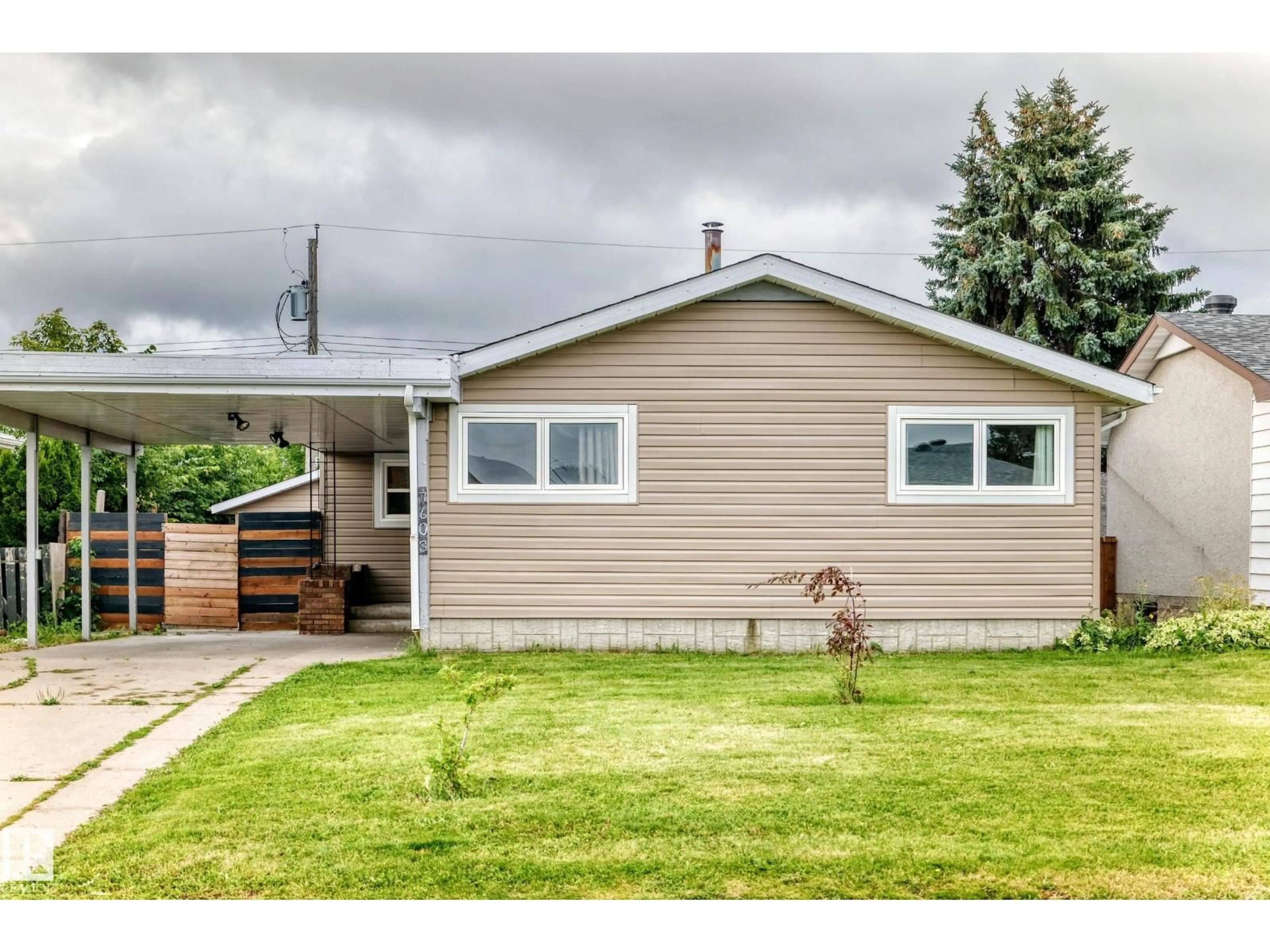Home with vinyl exterior material, street for 7603 130 AV, Edmonton Alberta T5C1Y3