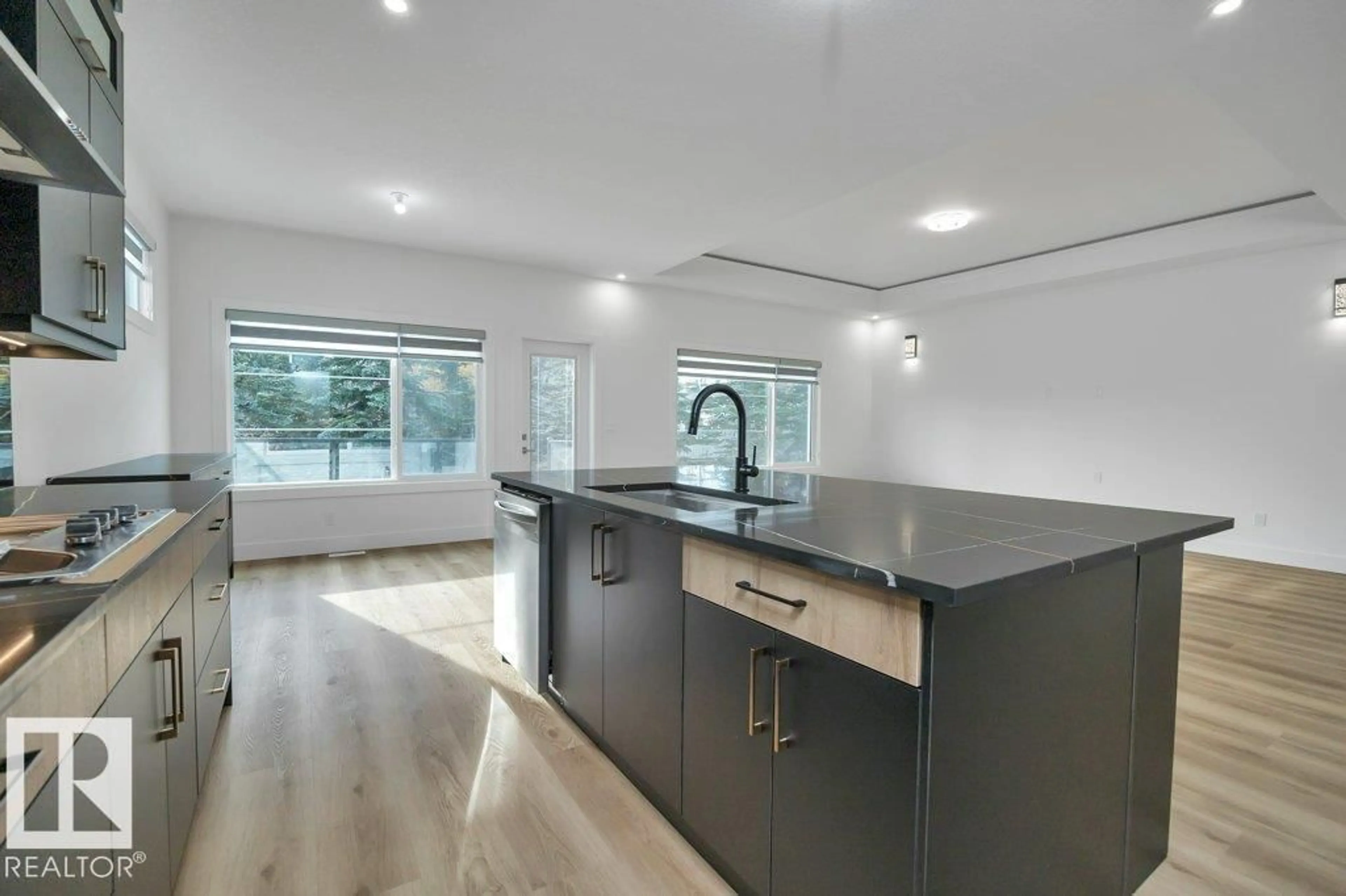 Open concept kitchen, wood/laminate floor for 4 SOUTHBRIDGE CRT, Calmar Alberta T0C0V0