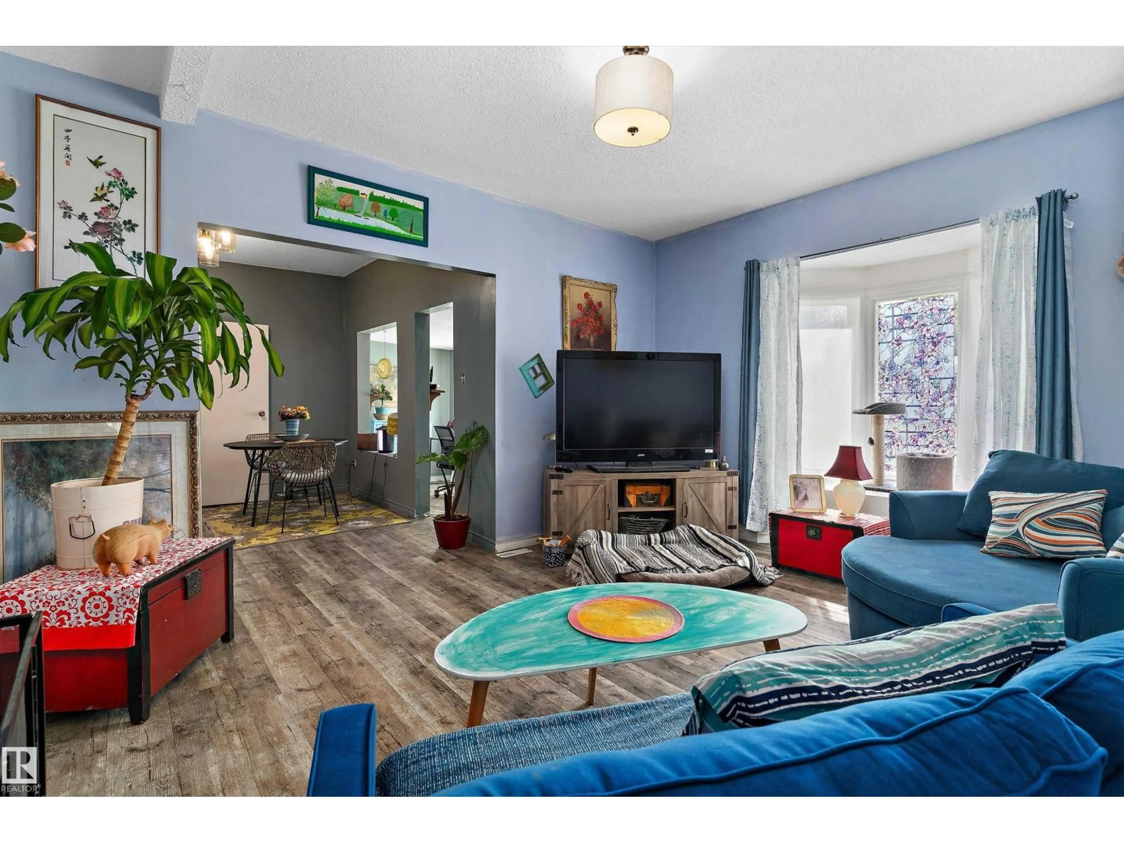 Living room with furniture, wood/laminate floor for 5404 45 AV, Wetaskiwin Alberta T9A0E9