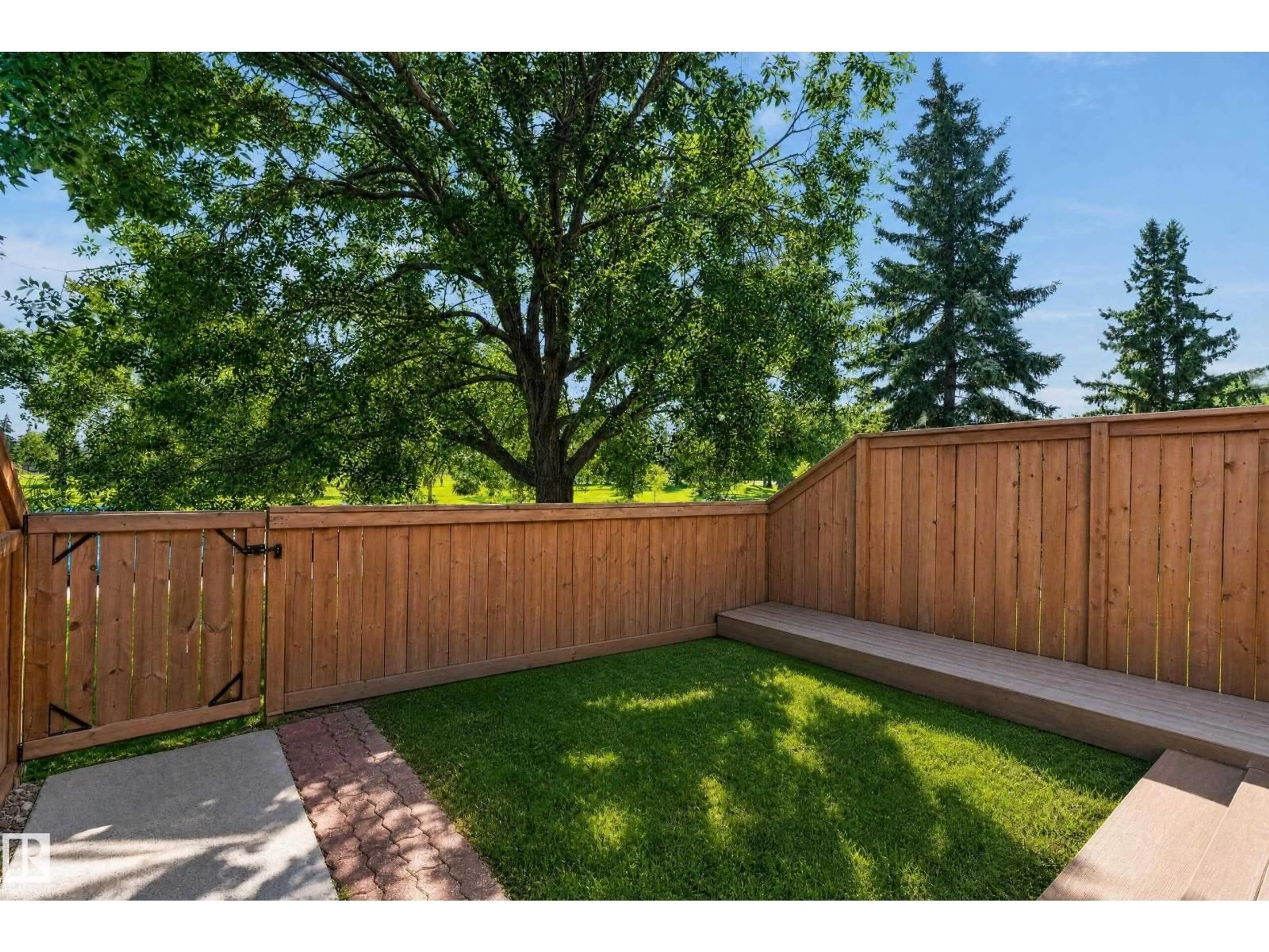 Patio, forest/trees view for 18247 93 AV, Edmonton Alberta T5T1V2