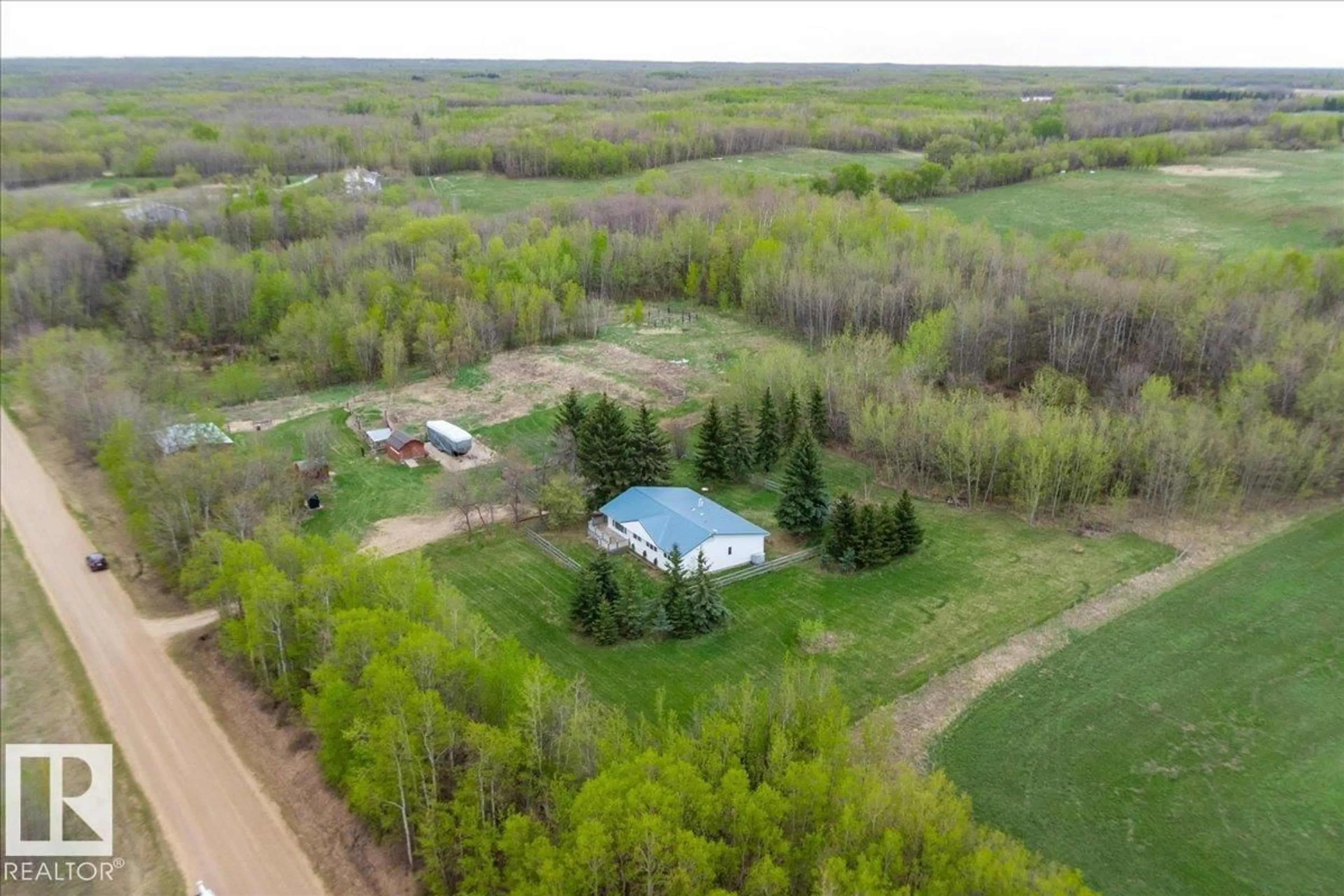 A pic from outside/outdoor area/front of a property/back of a property/a pic from drone, forest/trees view for 20511 TWP RD 502, Rural Beaver County Alberta T0B4J2