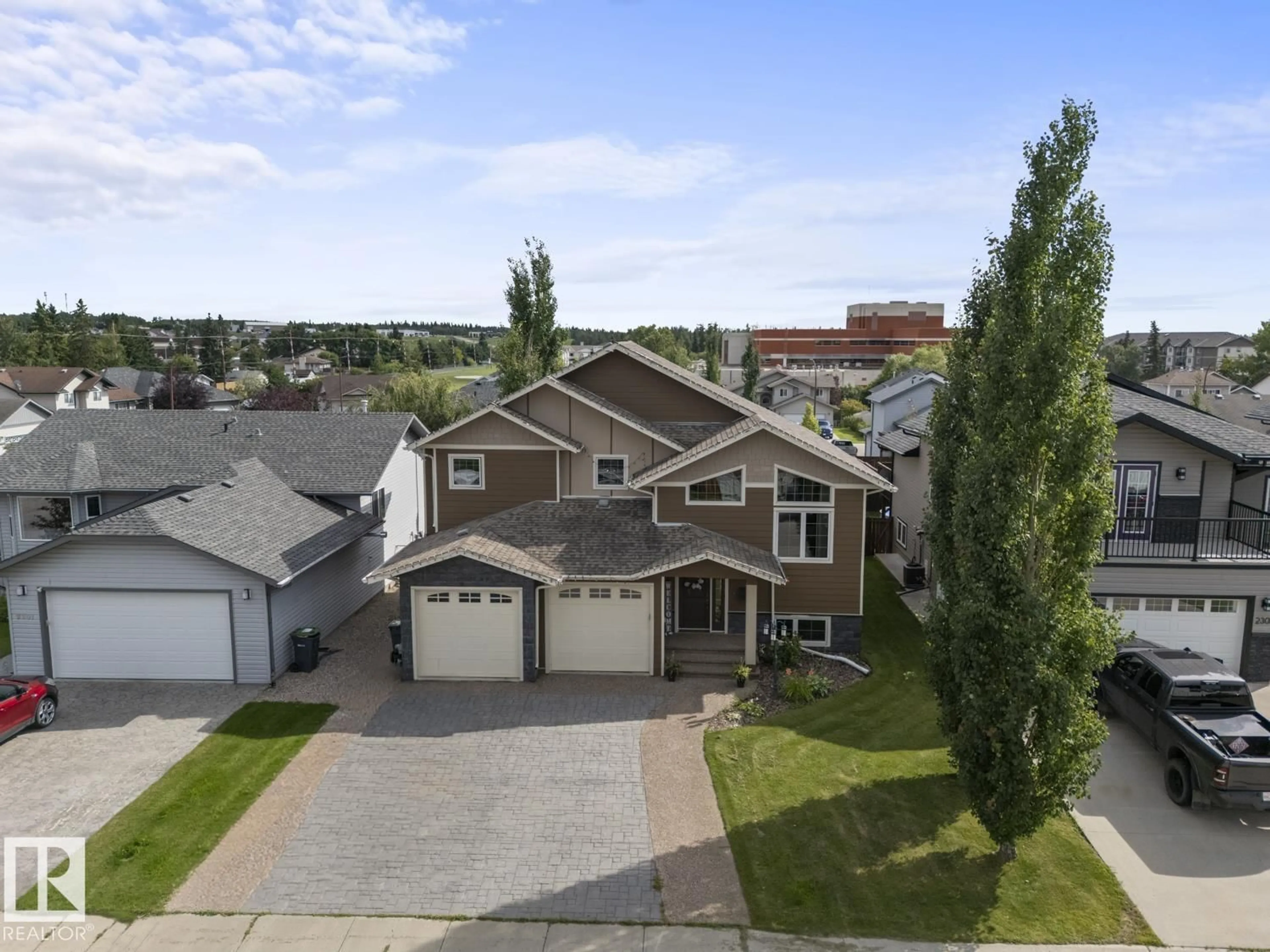 A pic from outside/outdoor area/front of a property/back of a property/a pic from drone, street for 2303 2 AV, Cold Lake Alberta T9M0A8