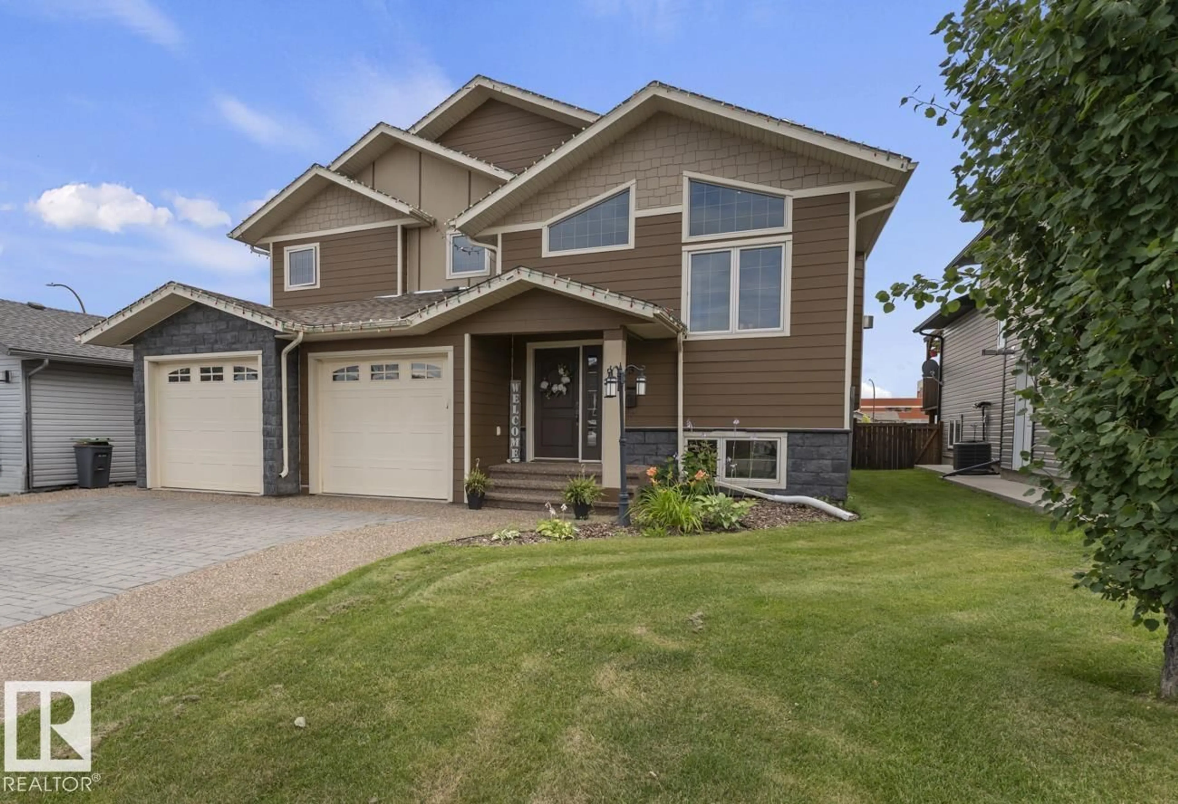 Home with vinyl exterior material, street for 2303 2 AV, Cold Lake Alberta T9M0A8