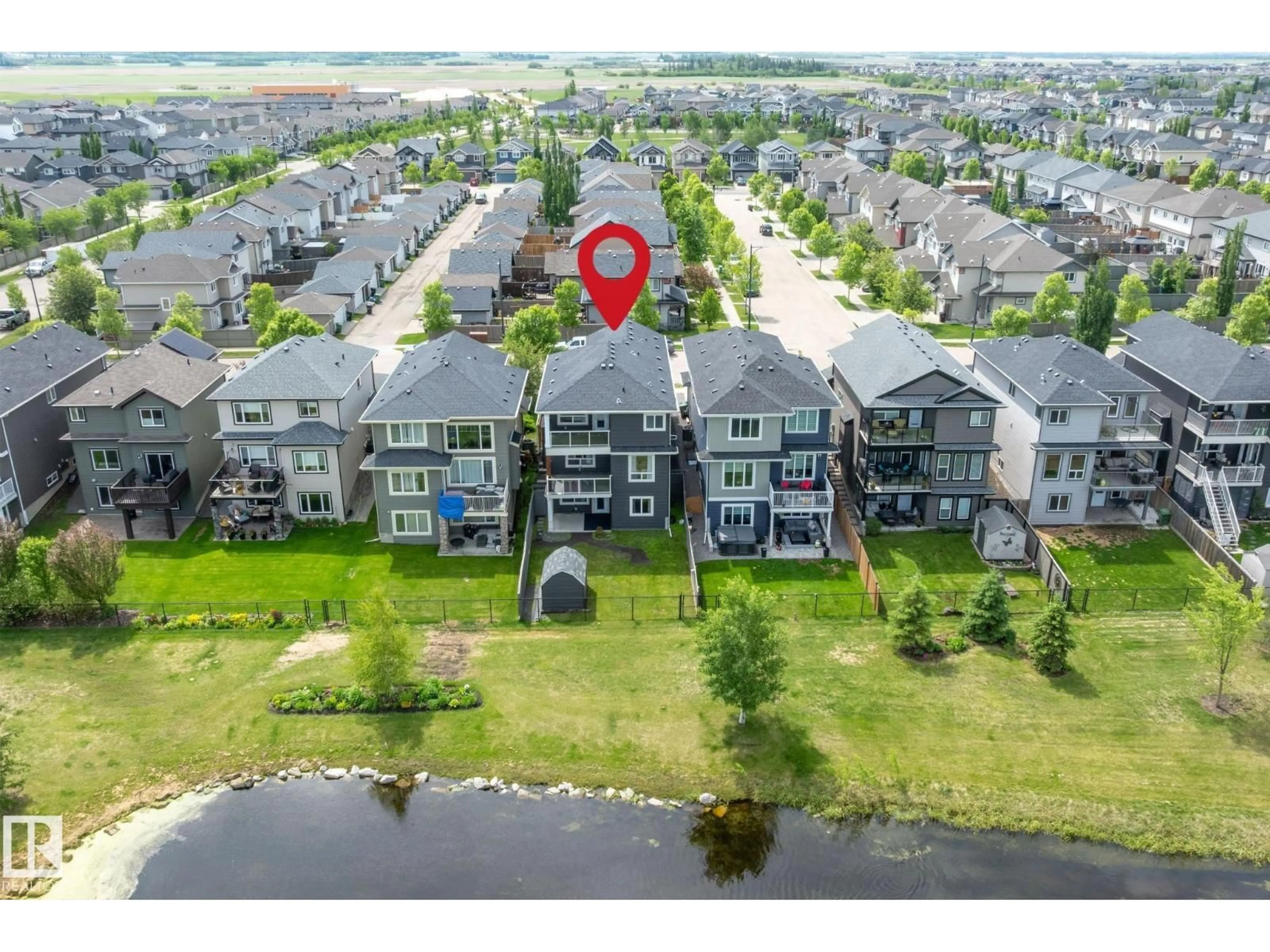A pic from outside/outdoor area/front of a property/back of a property/a pic from drone, water/lake/river/ocean view for 164 DURRAND BN, Fort Saskatchewan Alberta T8L0M8